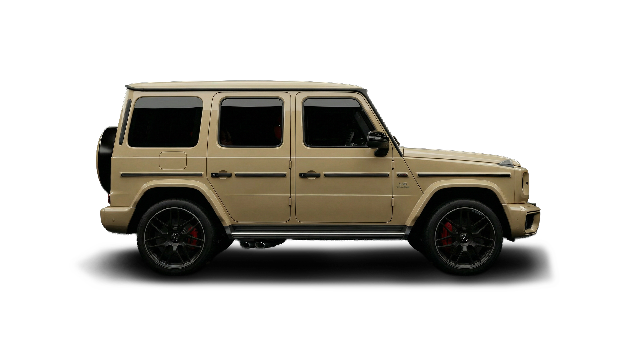 A beige luxury SUV with black wheels and red brake calipers, set against a black background.