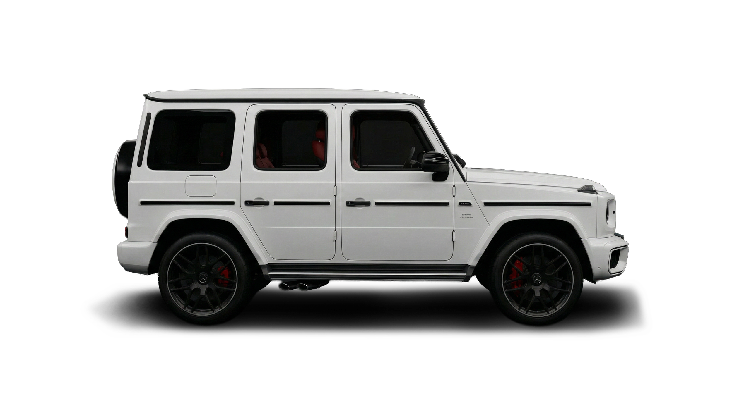 A white modern luxury SUV with black wheels and red brake calipers, set against a black background.