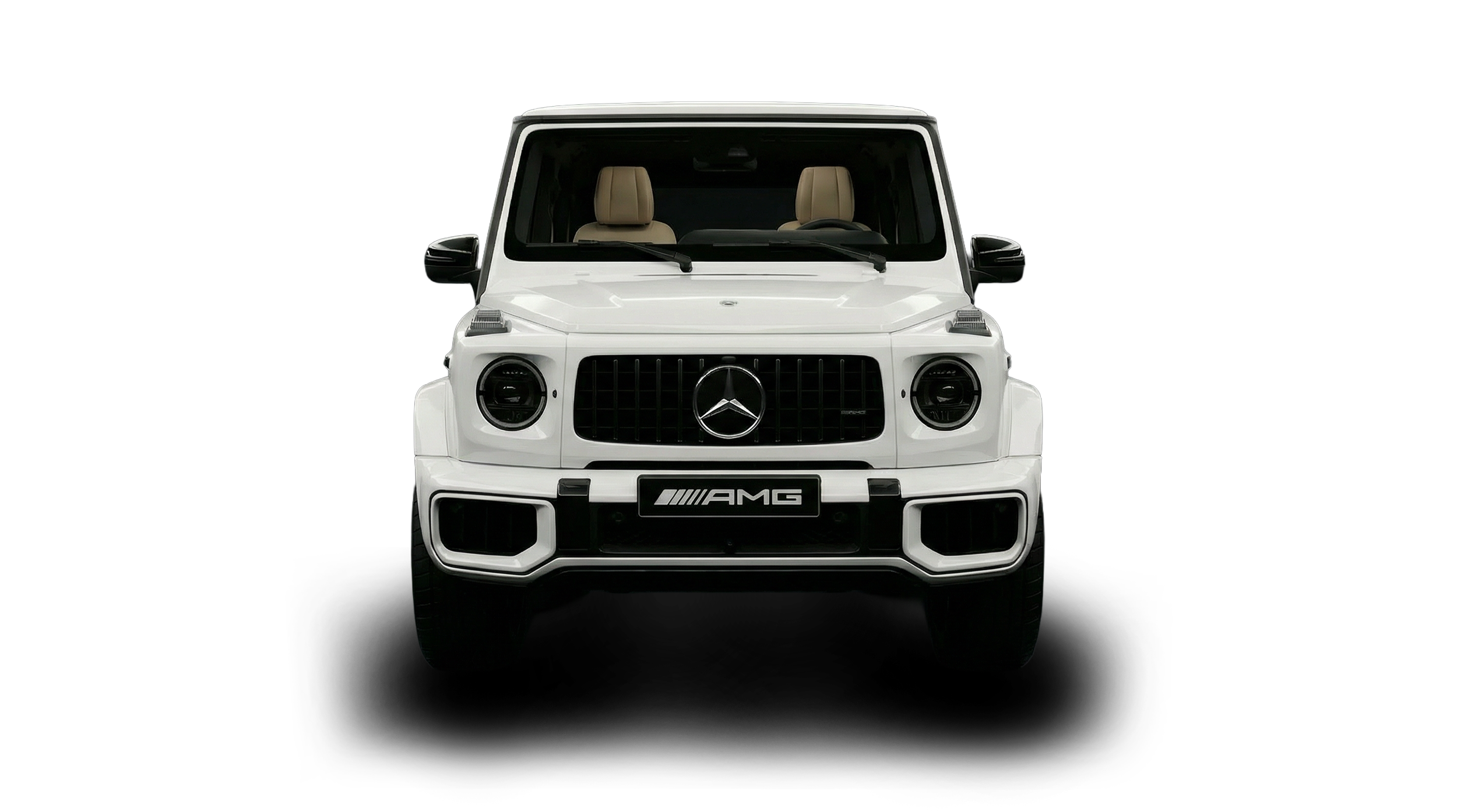 Front view of a white Mercedes Benz AMG G-Class SUV with black grille and beige interior