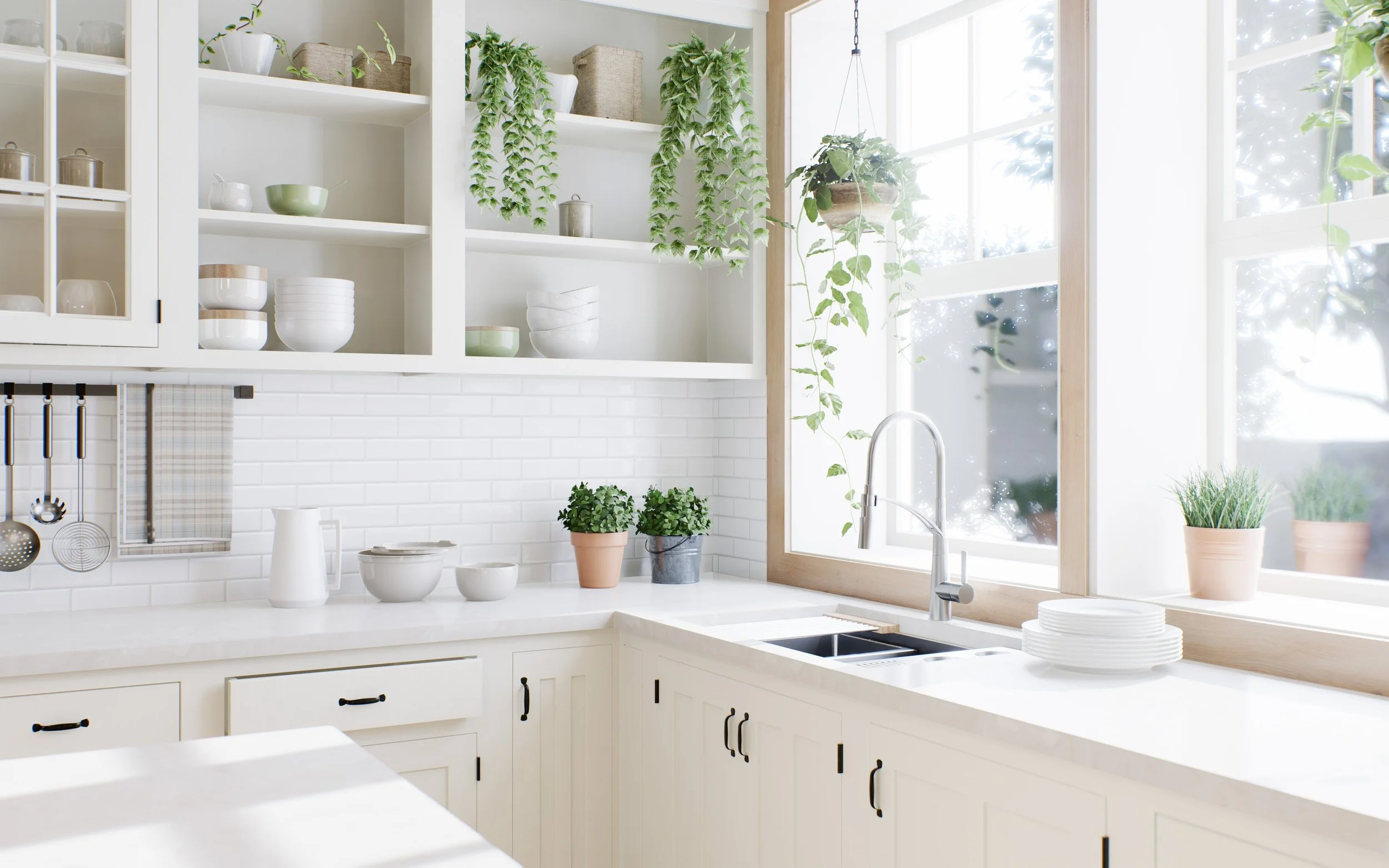 Bright white kitchen with open shelves, green plants, and a large window letting in natural light.