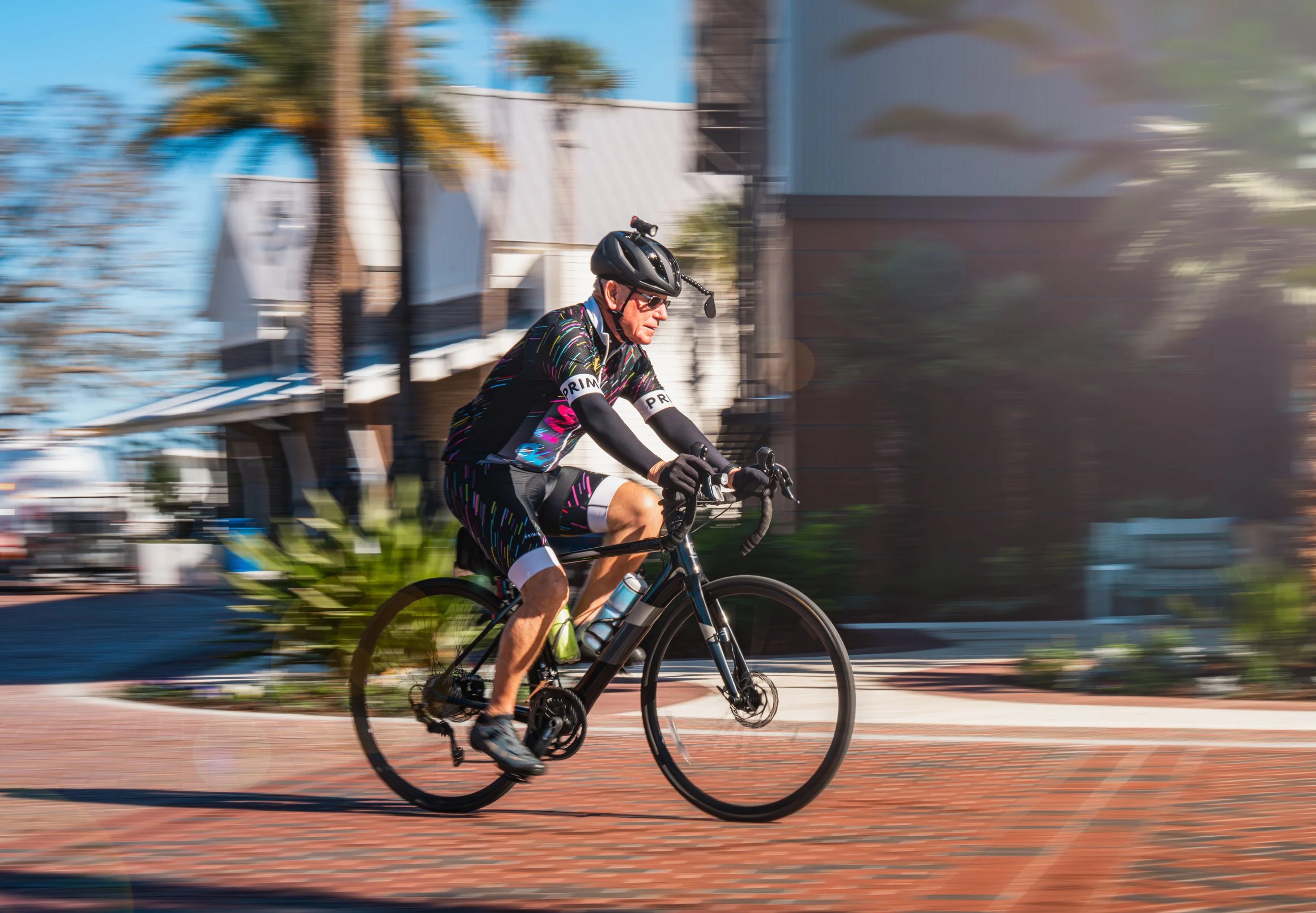 Cyclist riding bike with motion blur