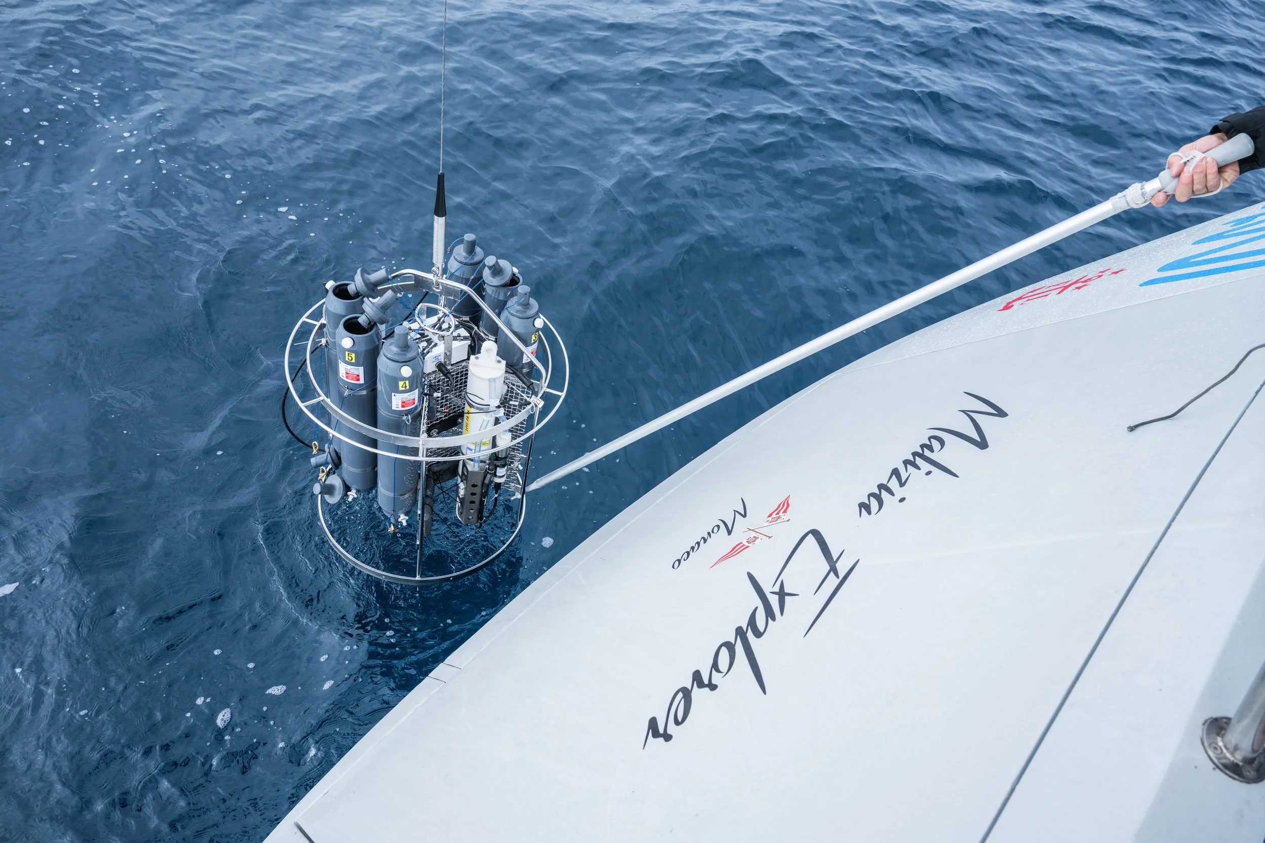 Malizia Explorer research vessel launching the scientific instrument Rosette, in Antarctica.