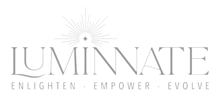Logo with the word "LUMINATE" and a stylized light burst above it, with the caption "Enlighten. Empower. Evolve."