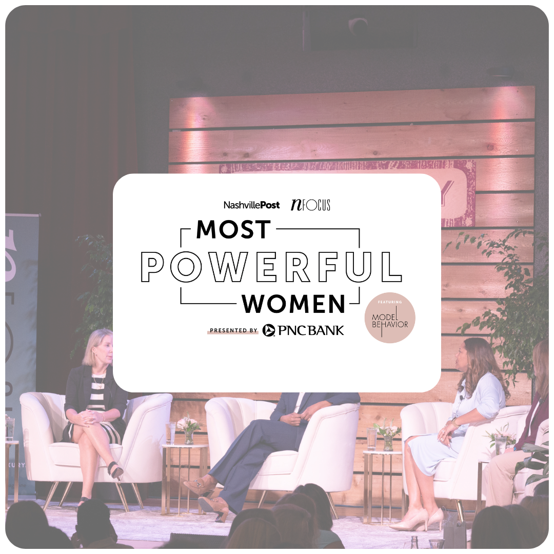 Screenshot of a panel discussion titled "Most Powerful Women" presented by Nashville Post, focusing on model behavior. Four women are seated on stage, engaged in conversation, with a wooden backdrop and plants surrounding them.