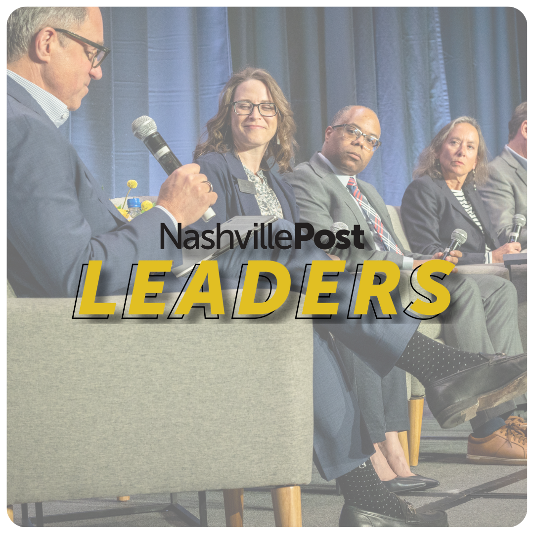 A panel of five diverse leaders sitting on stage at a Nashville Post event, engaged in discussion, with a blue curtain backdrop.