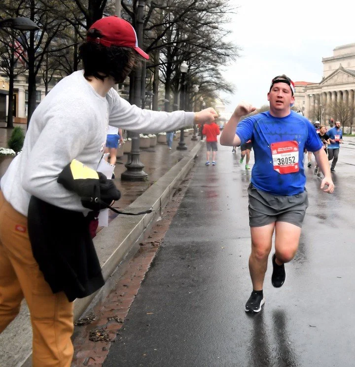 Great spectator support is part of what makes #CUCB so special! ⁠
⁠
#TBT to some rainy day fist bumps during the 2023 5K. 👊🏼