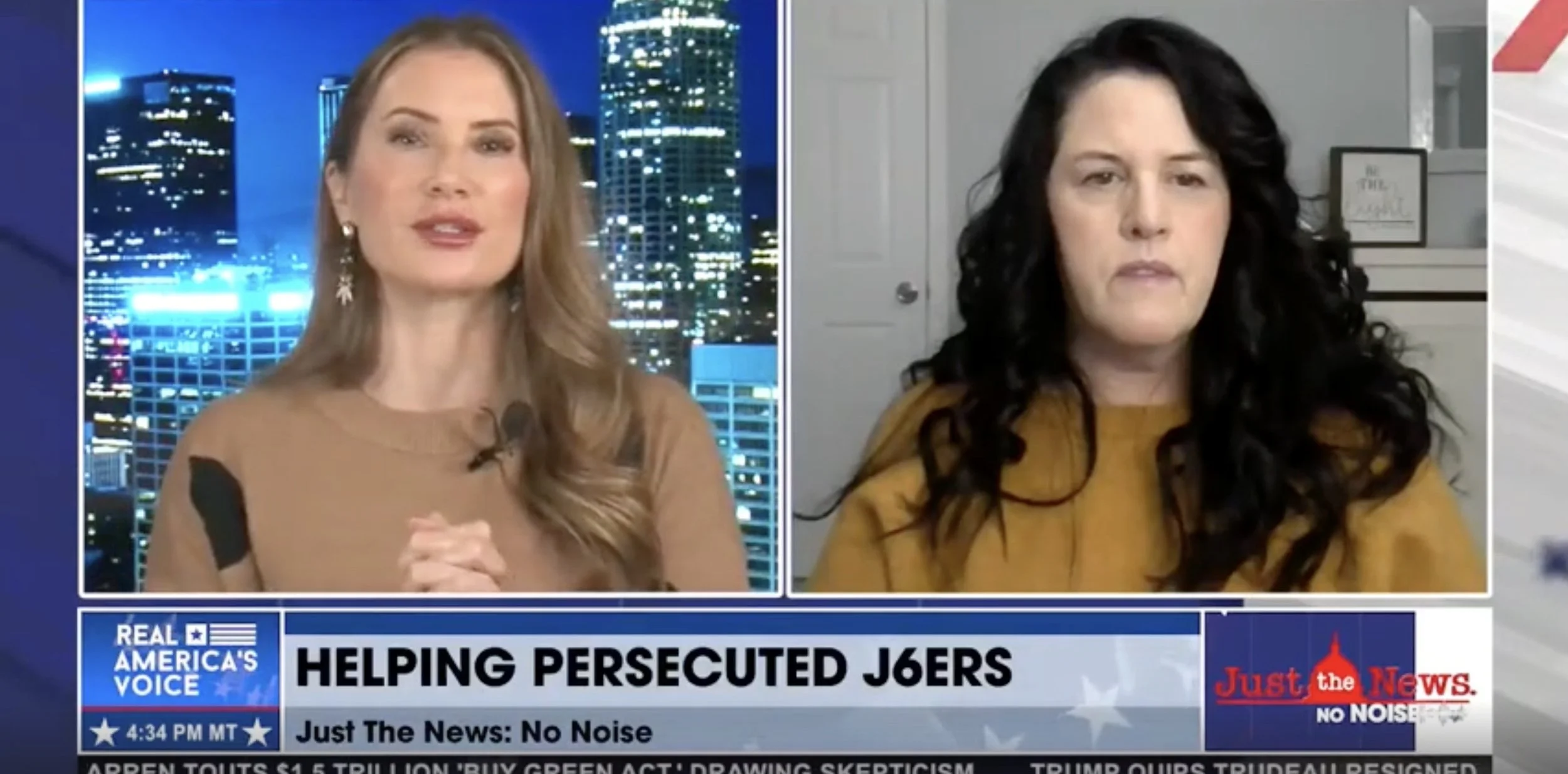 Screenshot of a news broadcast with two women. The woman on the left has light brown hair, wearing a brown top, and is speaking. The woman on the right has dark, curly hair and a serious expression. The news ticker at the bottom mentions helping persecuted J6ers, with logos for 'Real America's Voice' and 'Just the News'.