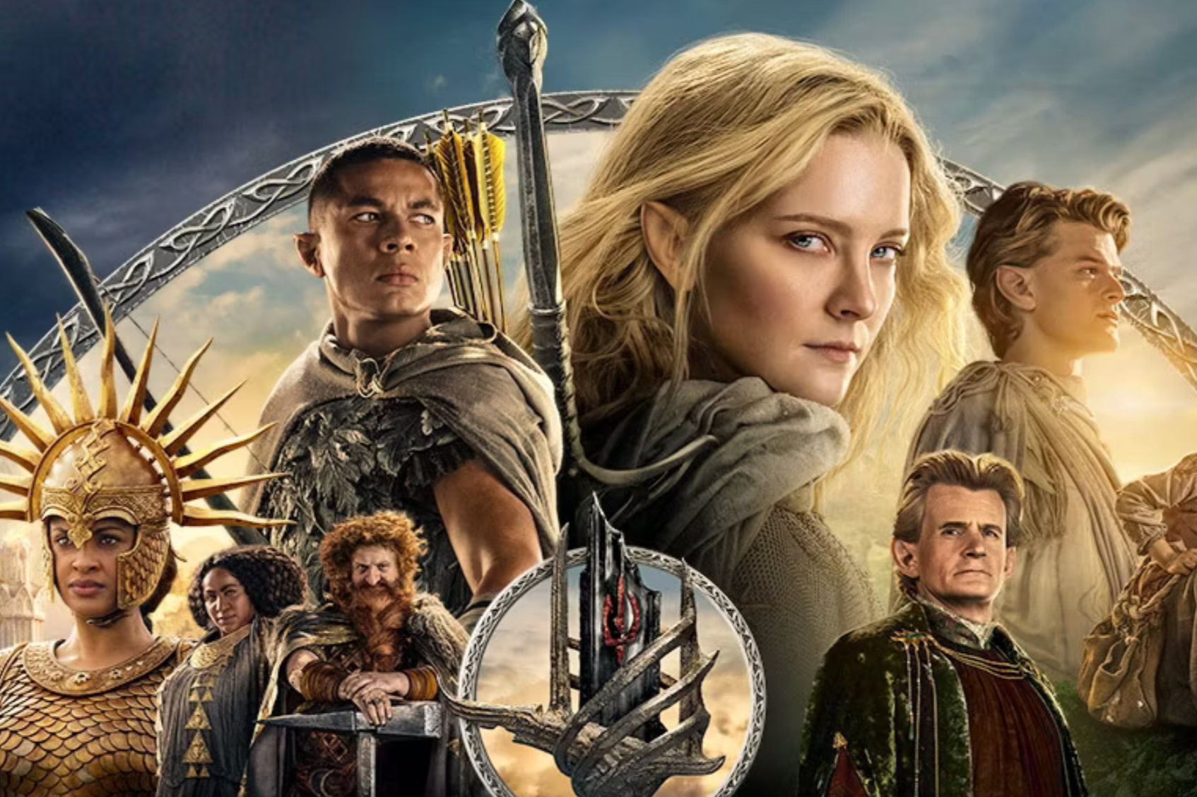 Poster for the movie 'The Hunger Games: The Ballad of Songbirds and Snakes' featuring characters in fantasy costumes with a dystopian landscape.
