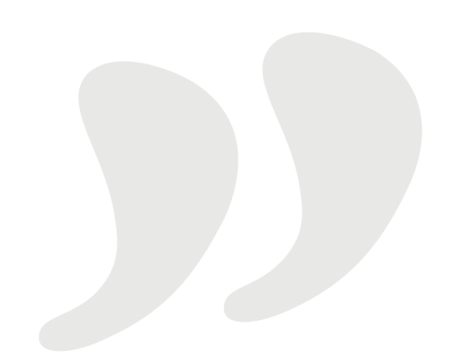 Two white quotation mark symbols on a black background.