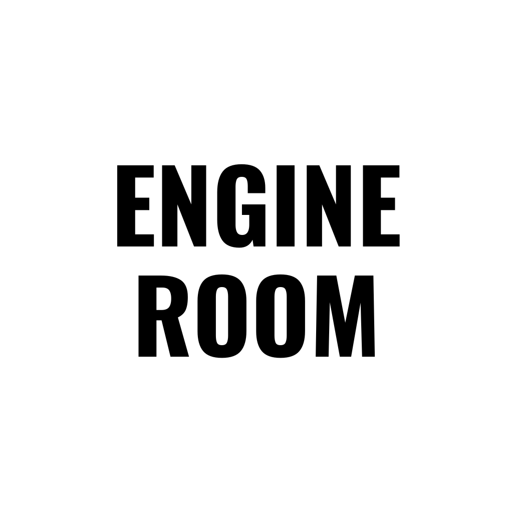 Sign with black text on white background that reads "ENGINE ROOM."