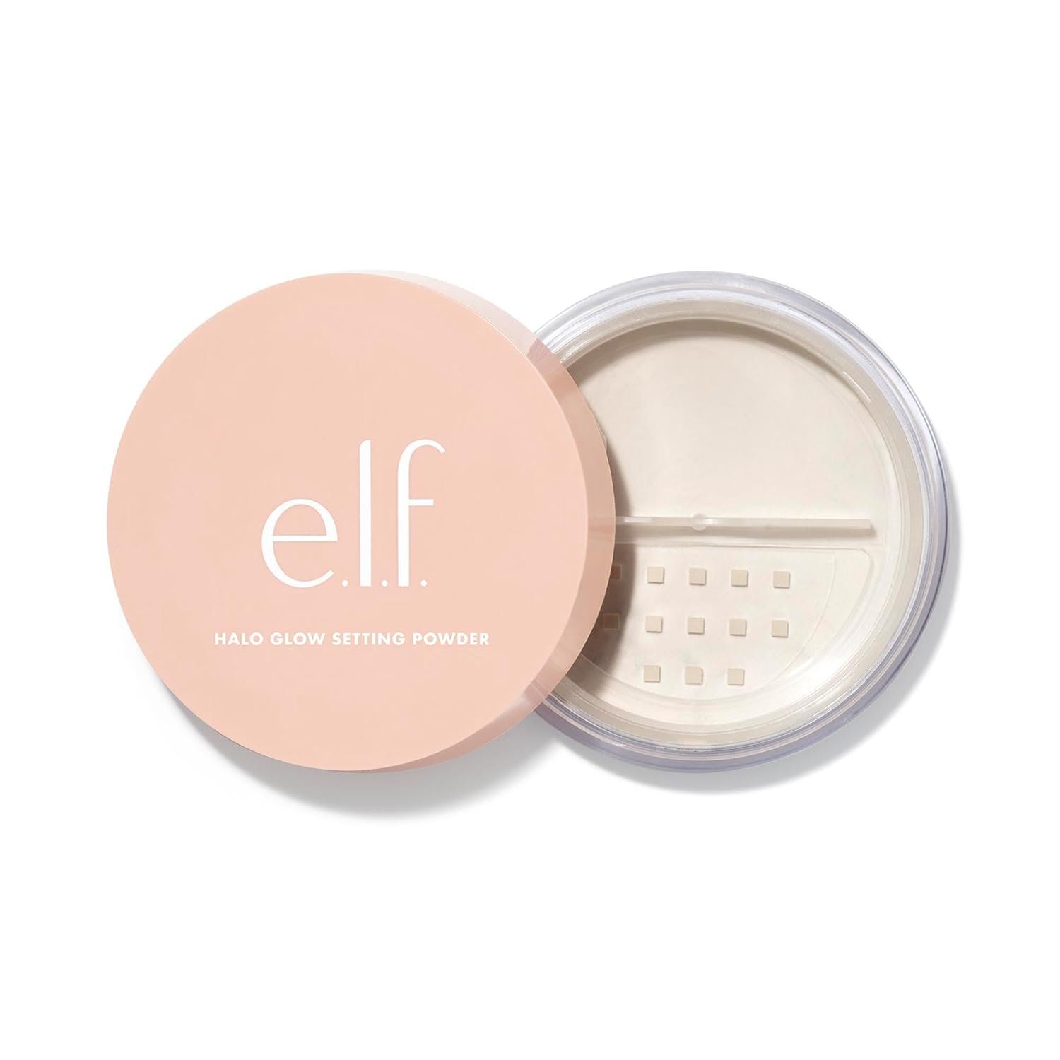 Open container of e.l.f. Halo Glow Setting Powder with pink lid and white powder inside.