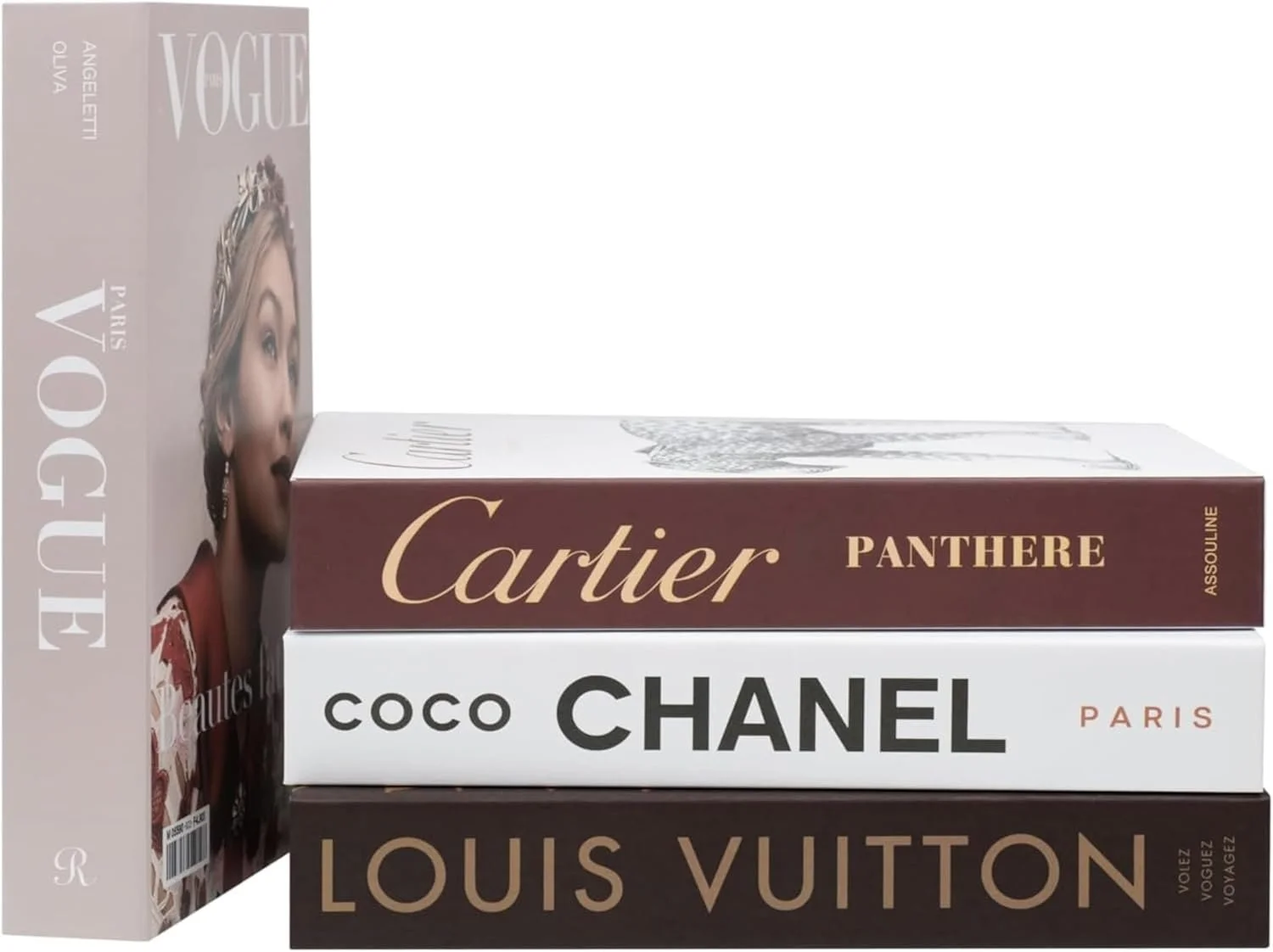 Stack of four fashion coffee table books, including 'Vogue', 'Cartier Panthere', 'Coco Chanel', and 'Louis Vuitton', with a magazine featuring a woman on the cover leaning against the books.