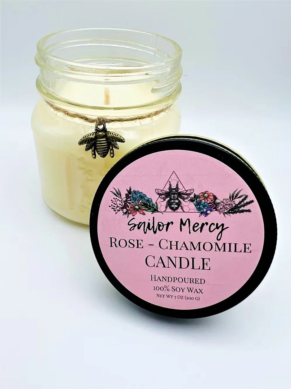 Sailor Mercy rose chamomile soy candle in glass jar with soft floral scent