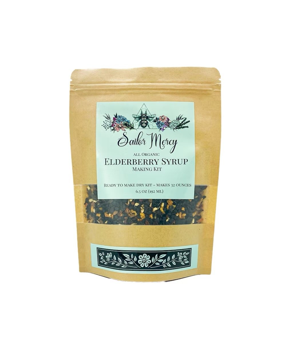 DIY elderberry syrup kit with dried elderberries and herbs to make homemade elderberry syrup.