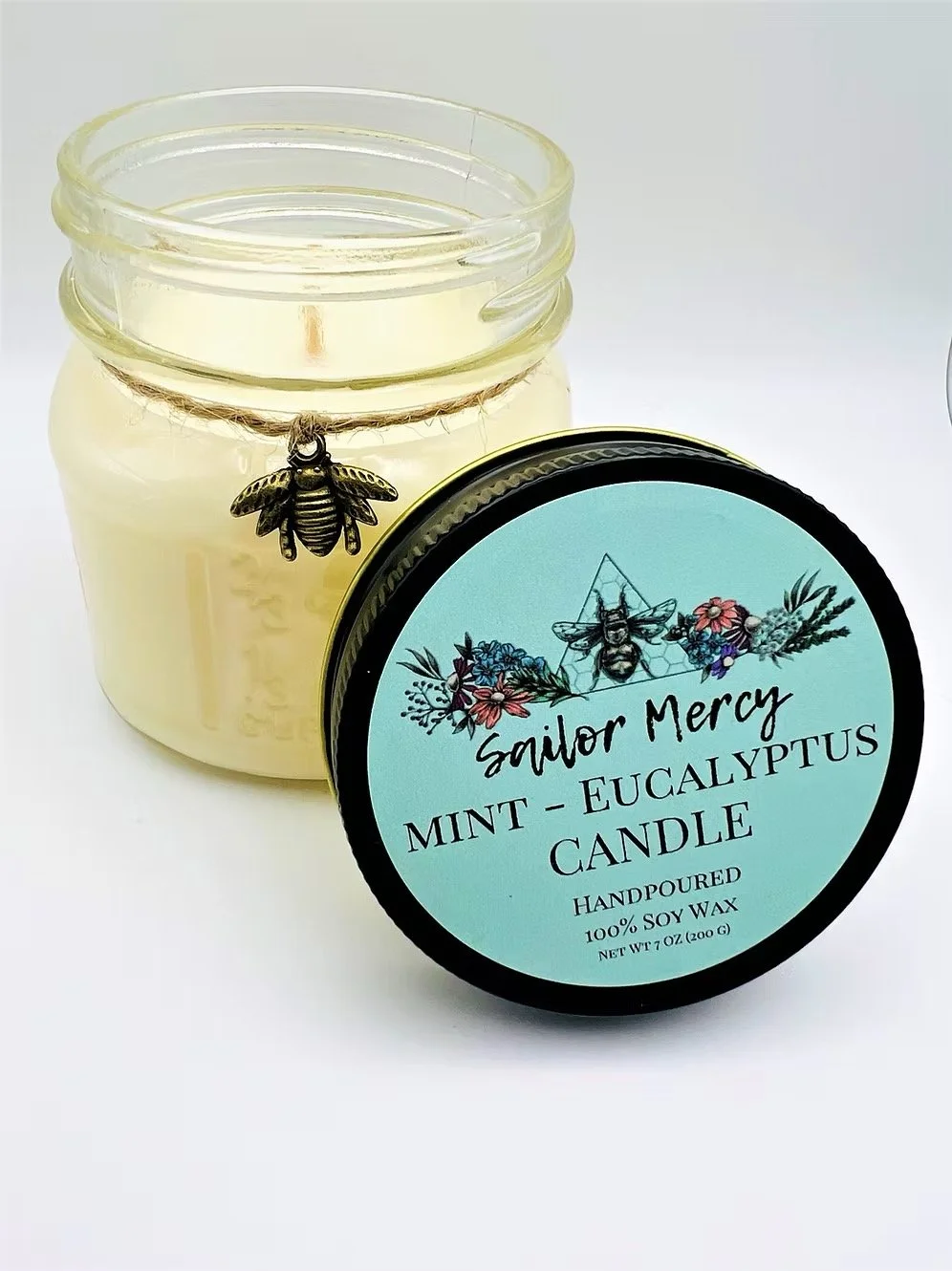 Sailor Mercy mint eucalyptus soy candle in glass jar with fresh clean scent
