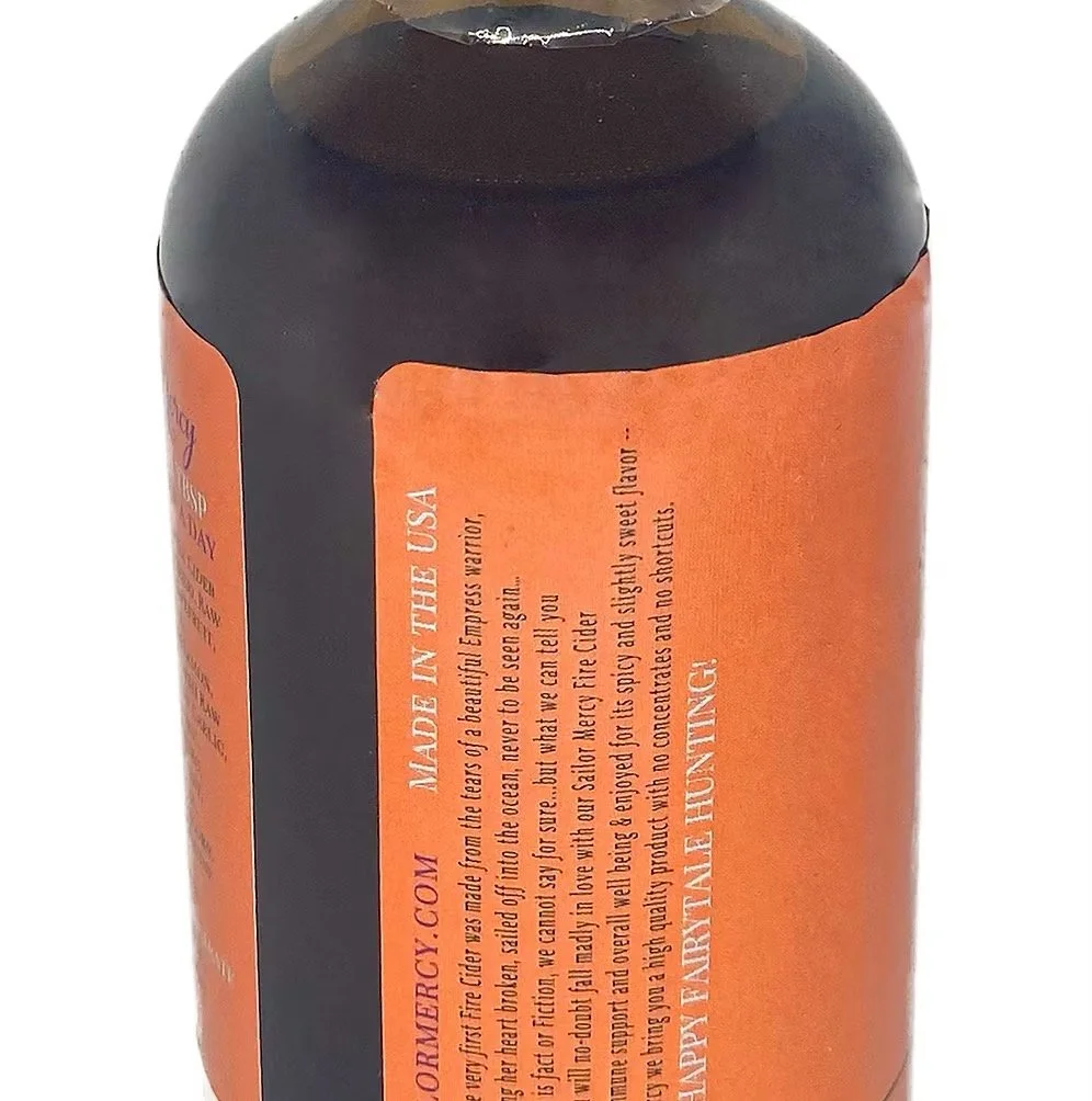 Fire cider bottle back label with usage instructions and wellness tonic information