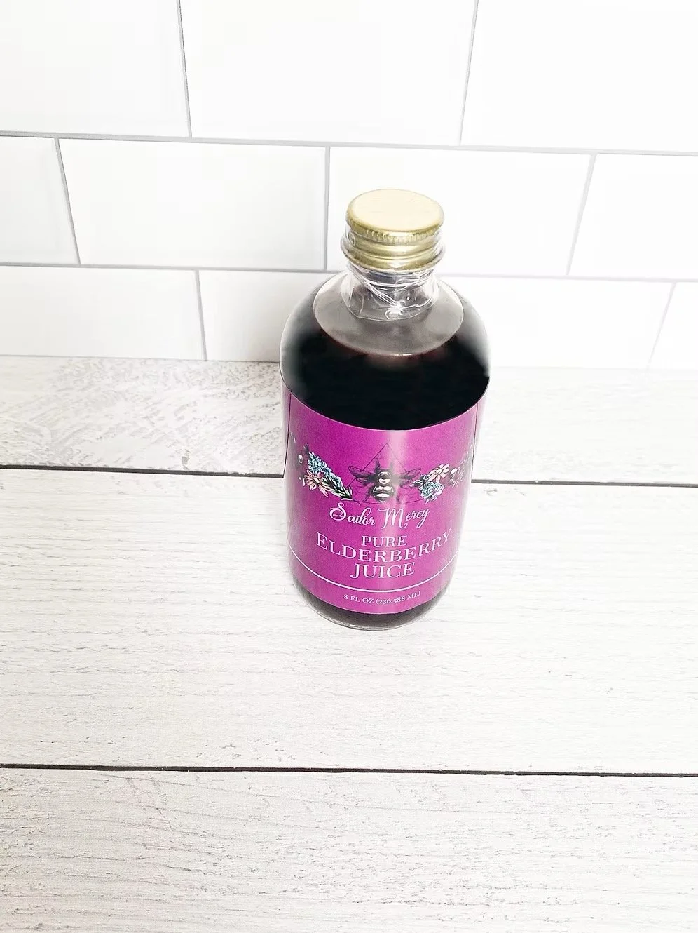 8oz pure elderberry juice bottle unsweetened elderberry wellness product