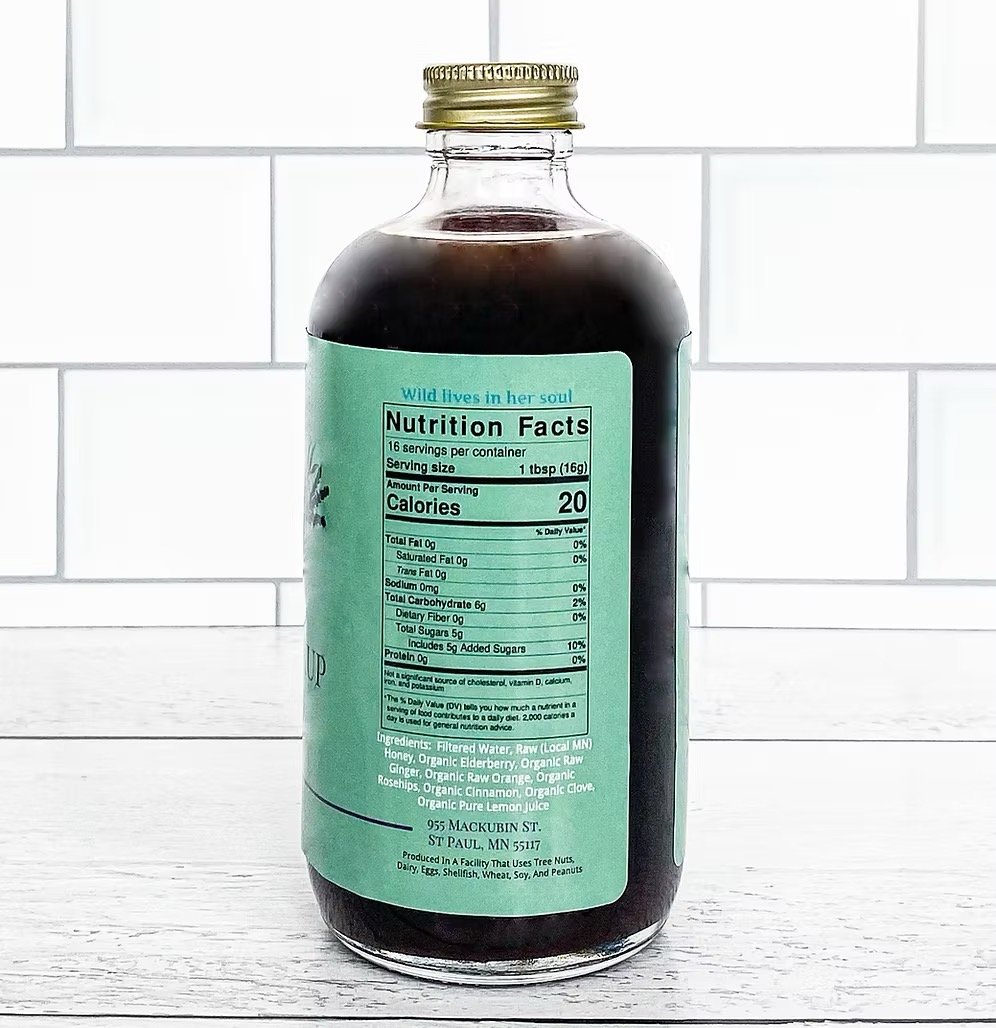 Elderberry syrup bottle back label with nutrition facts and ingredient details, small-batch herbal syrup