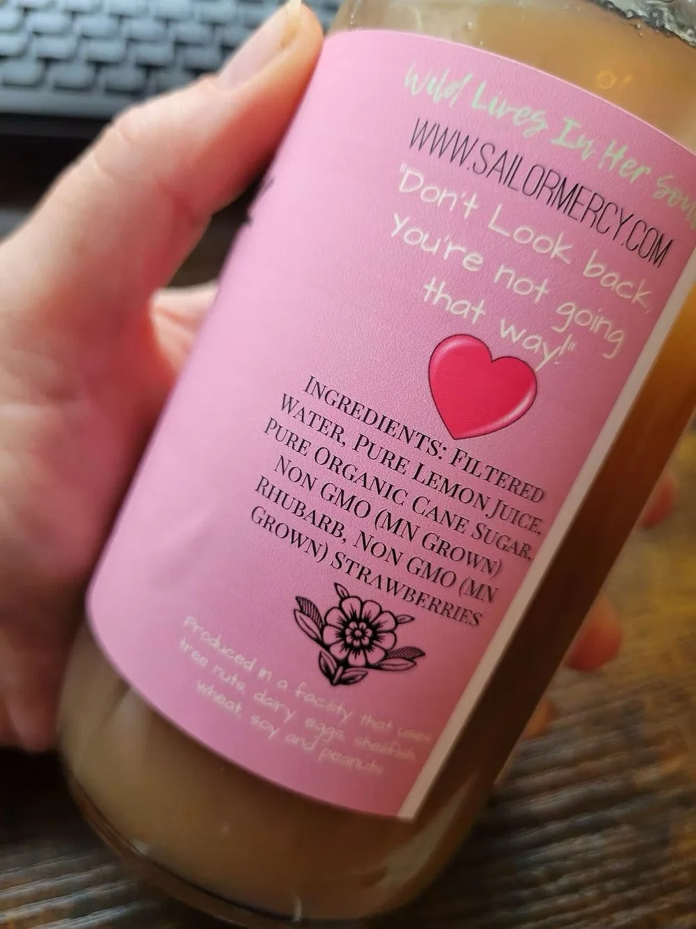Rhubarb strawberry lemonade ingredients and product label on bottle