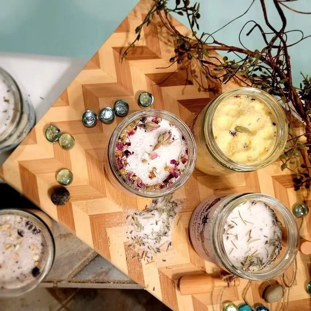natural bath tea soak with dried flowers, salts, and herbal blends