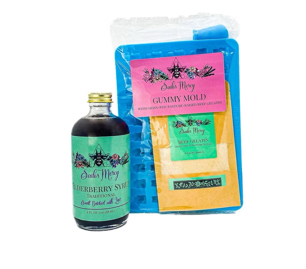 Complete elderberry gummy kit with syrup bottle, gelatin mix, and silicone mold