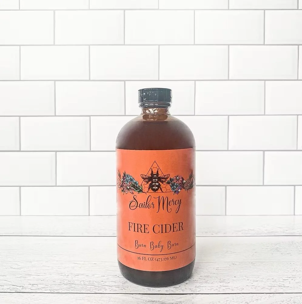 Fire cider bottle front label featuring small-batch apple cider vinegar tonic