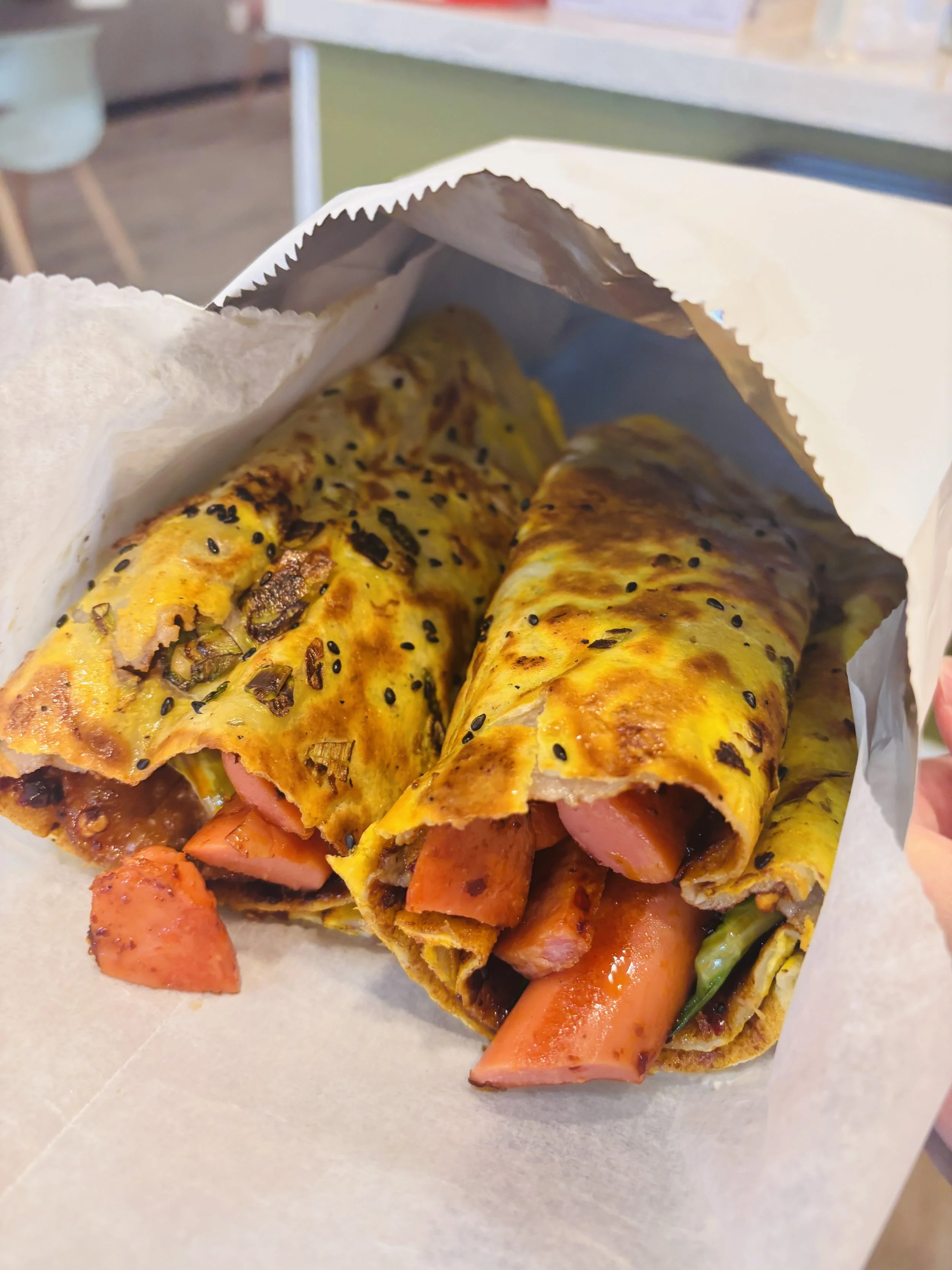 egg sausage jianbingguozi, 煎饼果子 a popular street food