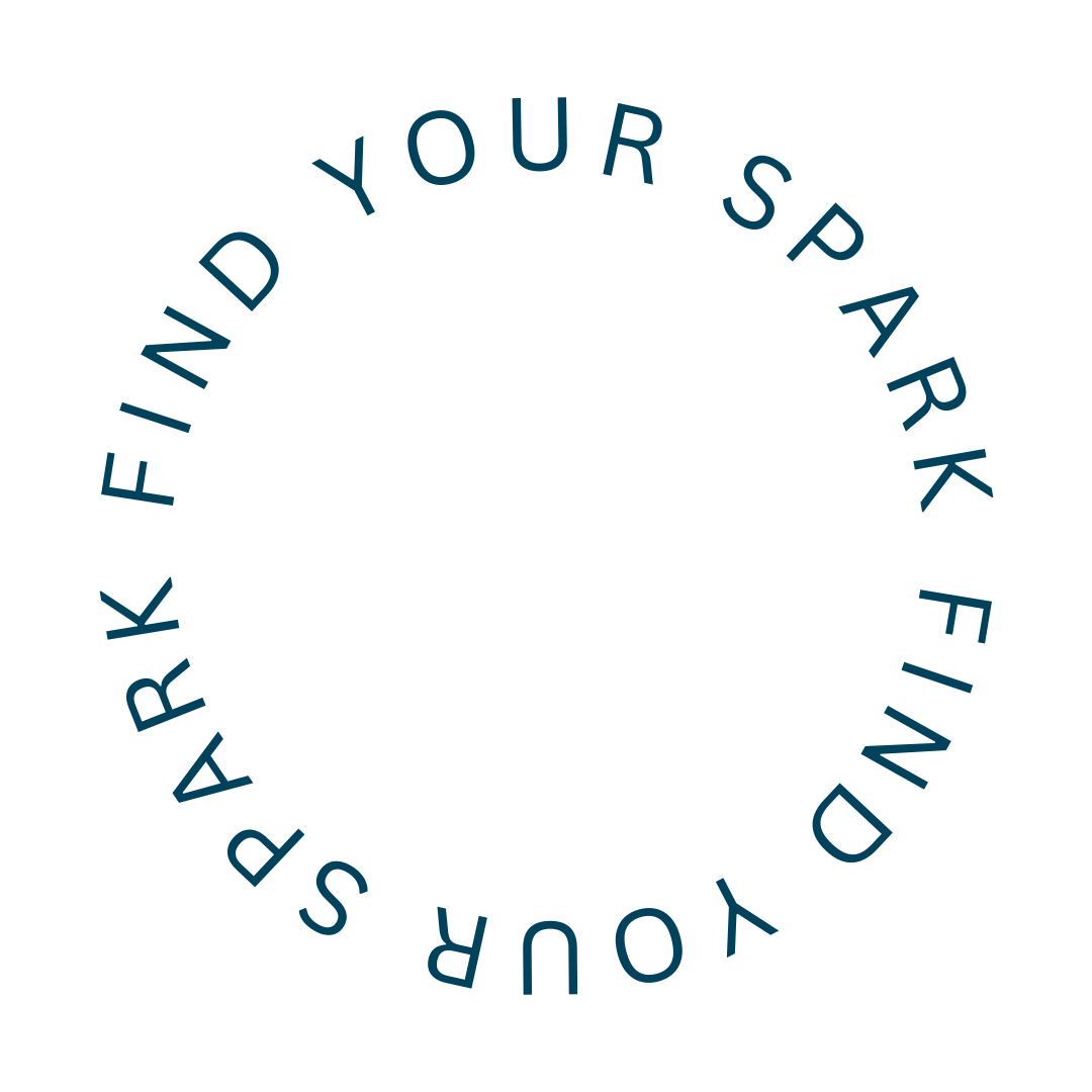 A black circle with dark blue text that says, 'Find your spark' arranged in a circular pattern.
