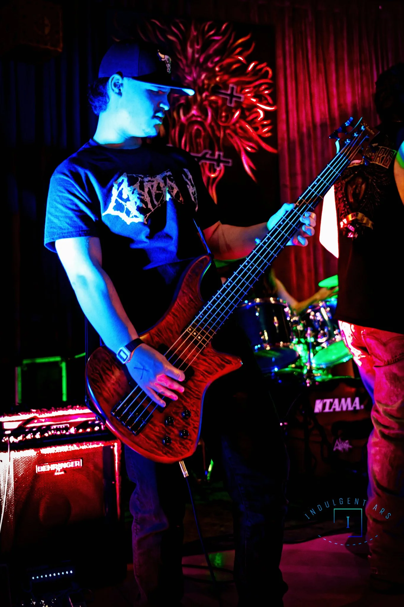 Corpse Corrosion's bassist captured in action.