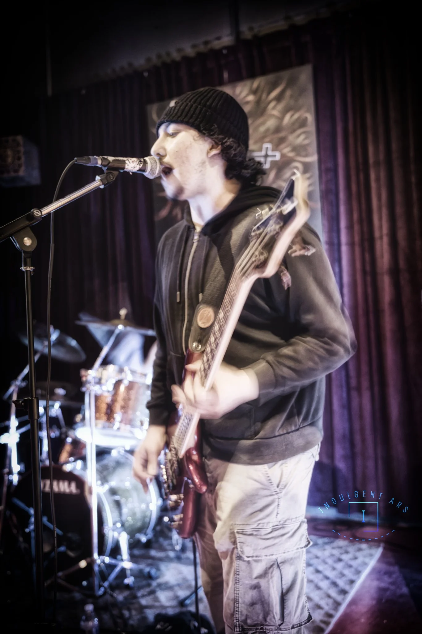 Slowrot's bassist captured in action, as he performs a vocal part.