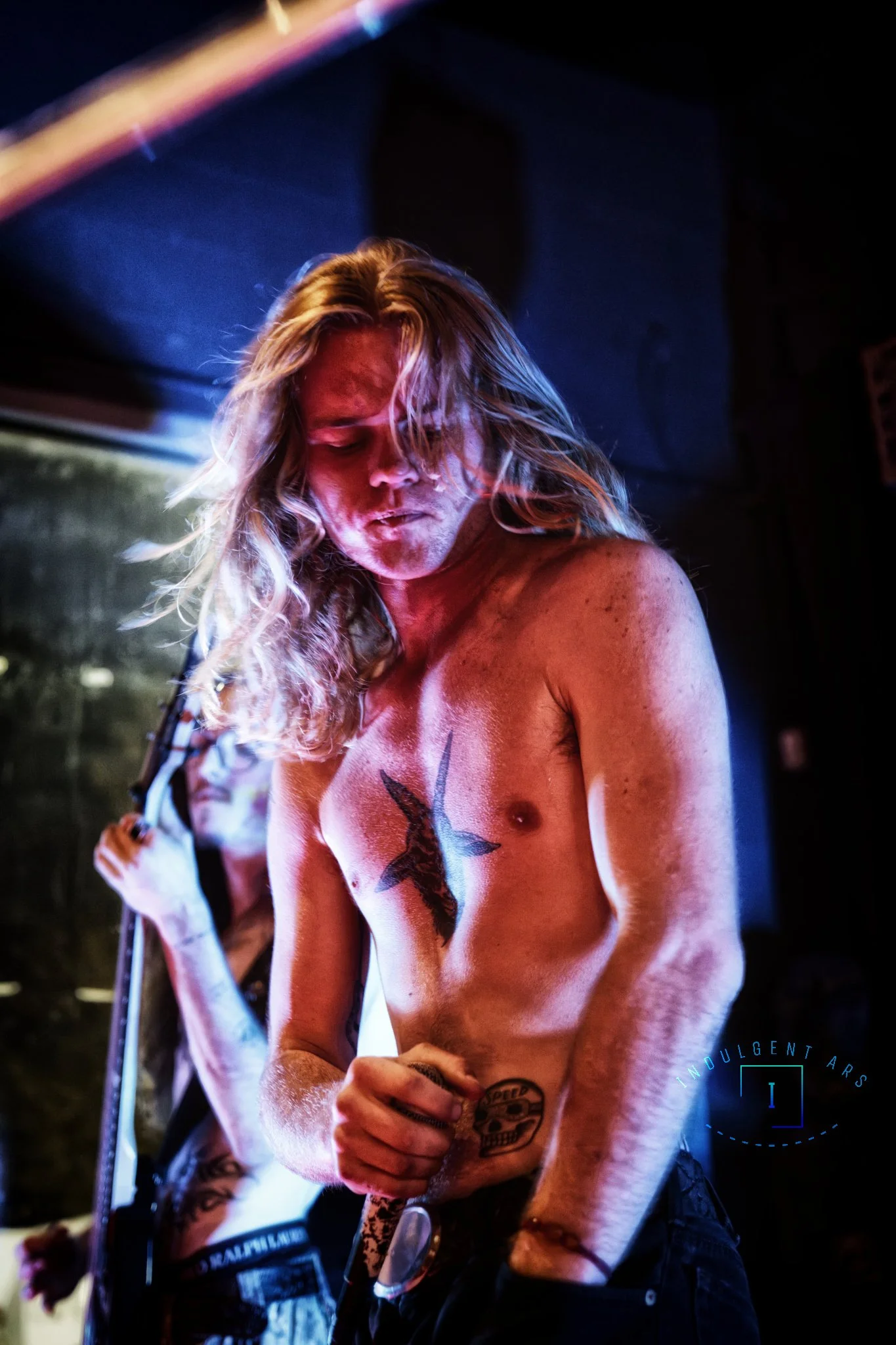 Slowrot's lead vocalist captured in action.