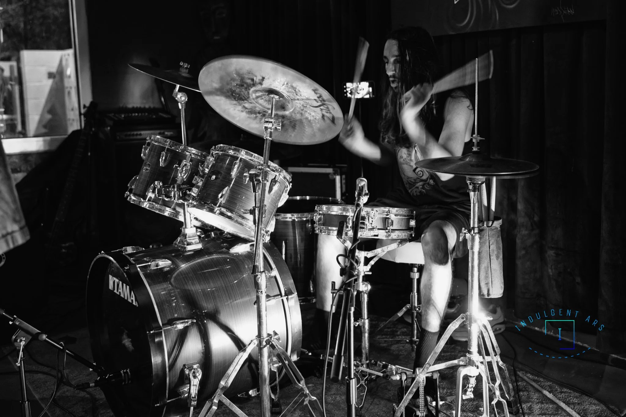 Corpse Corrosion's drummer captured in action. This photo is captured in a high contrast B&W.