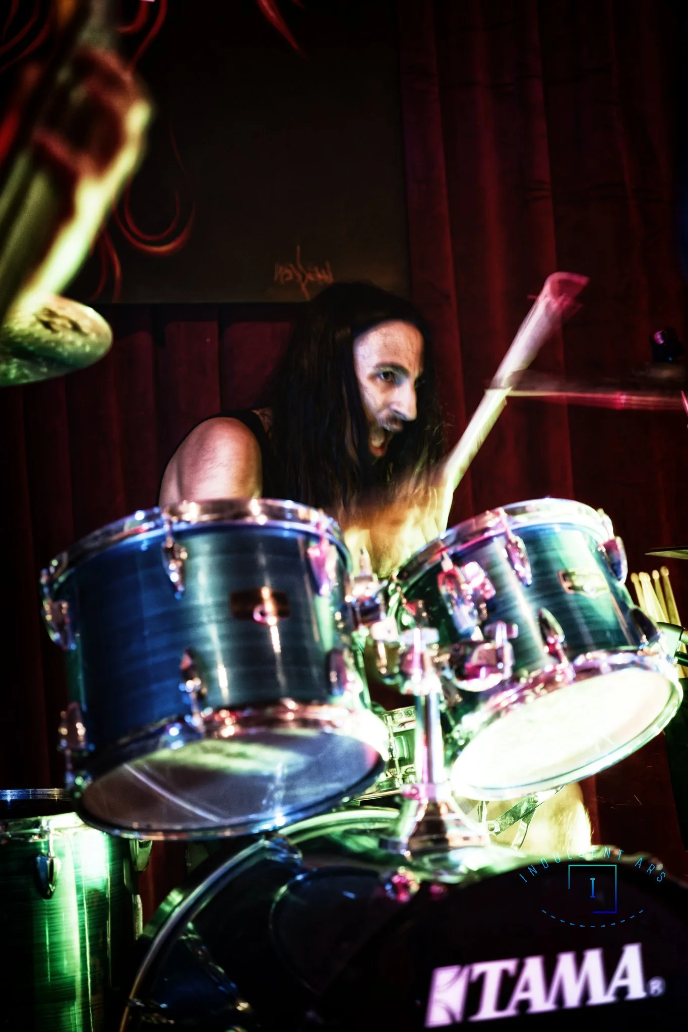 Corpse Corrosion's drummer captured in action.