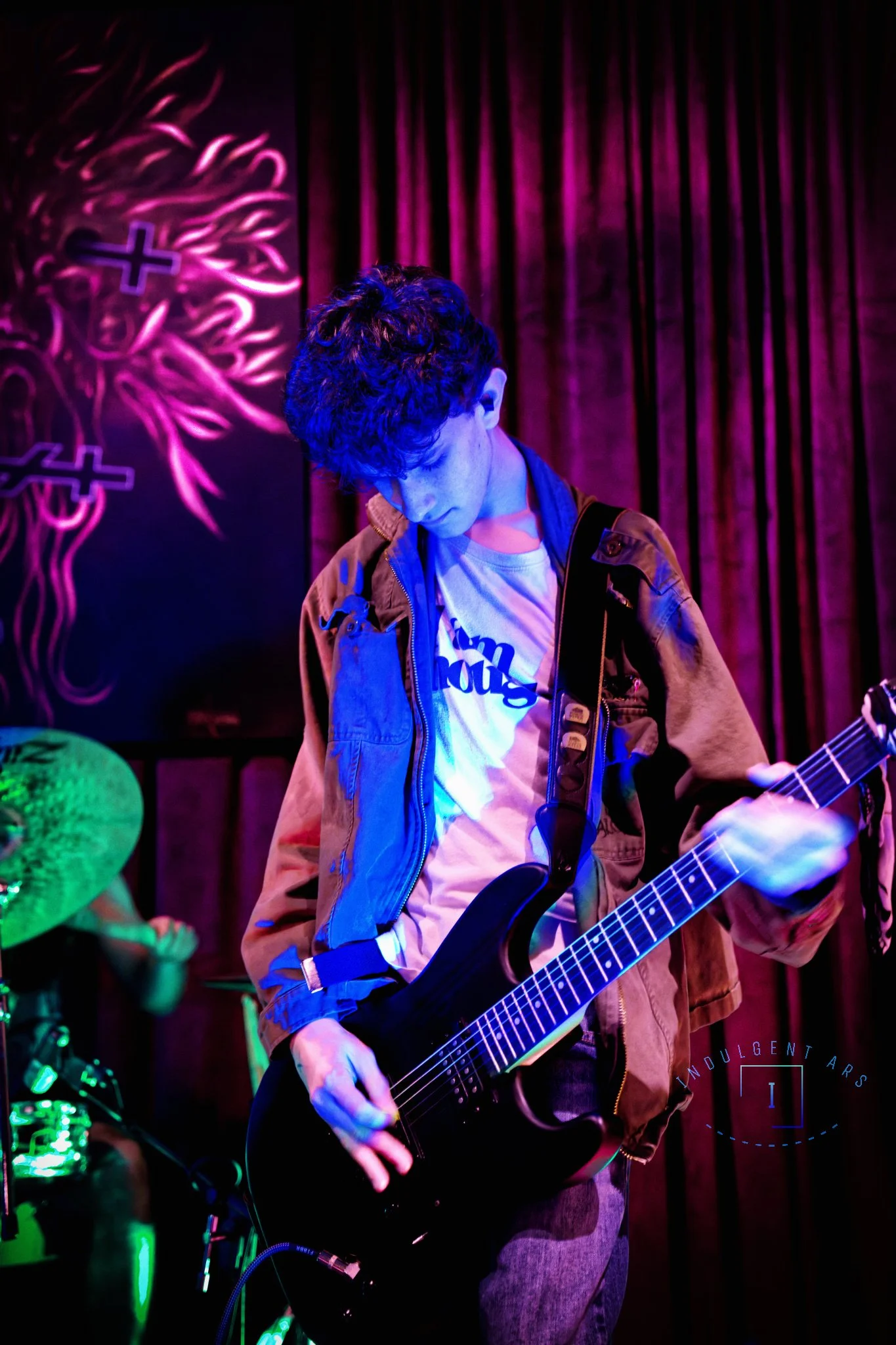 Corpse Corrosion's guitarist captured in action.