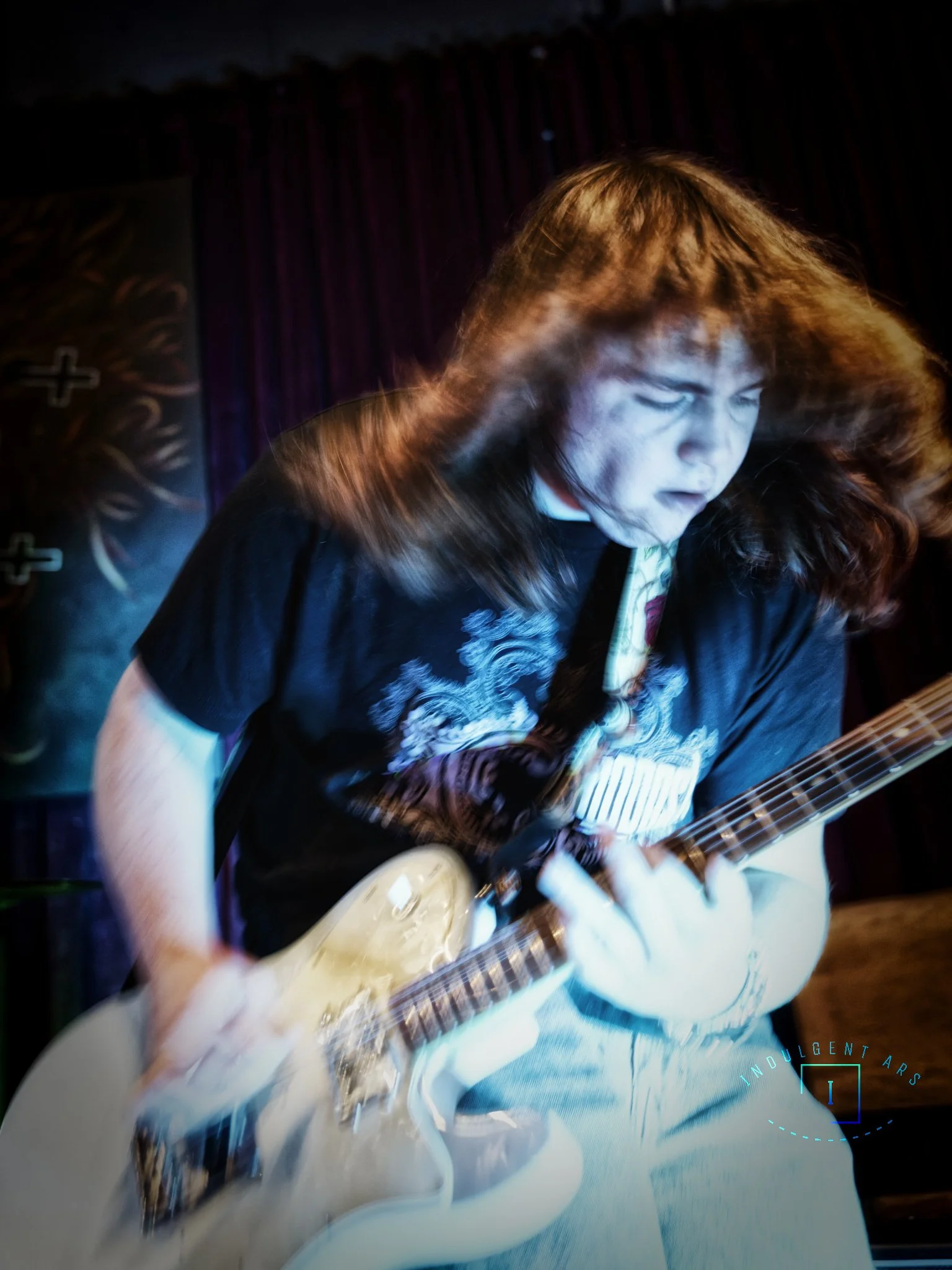 Another guitarist for Exoplasm, is captured in action. 