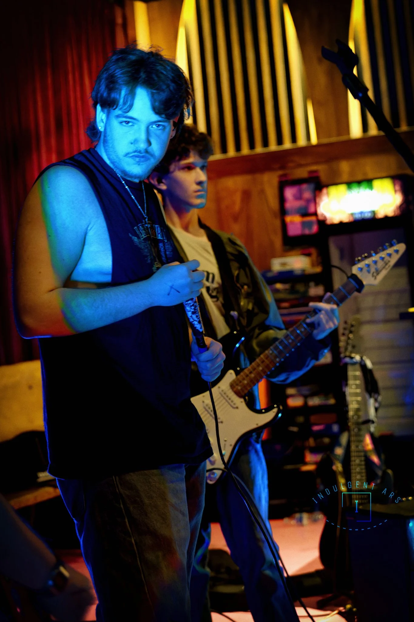 Corpse Corrosion's vocalist and guitarist captured in action.