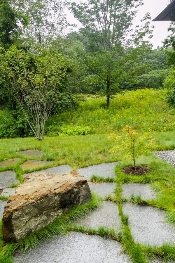  Large monolithic Goshen stones with native grass joints and large native stone bench 