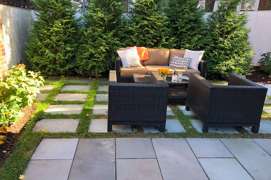  Brick patio, bluestone steps set in lawn with stone retaining walls in Fall 