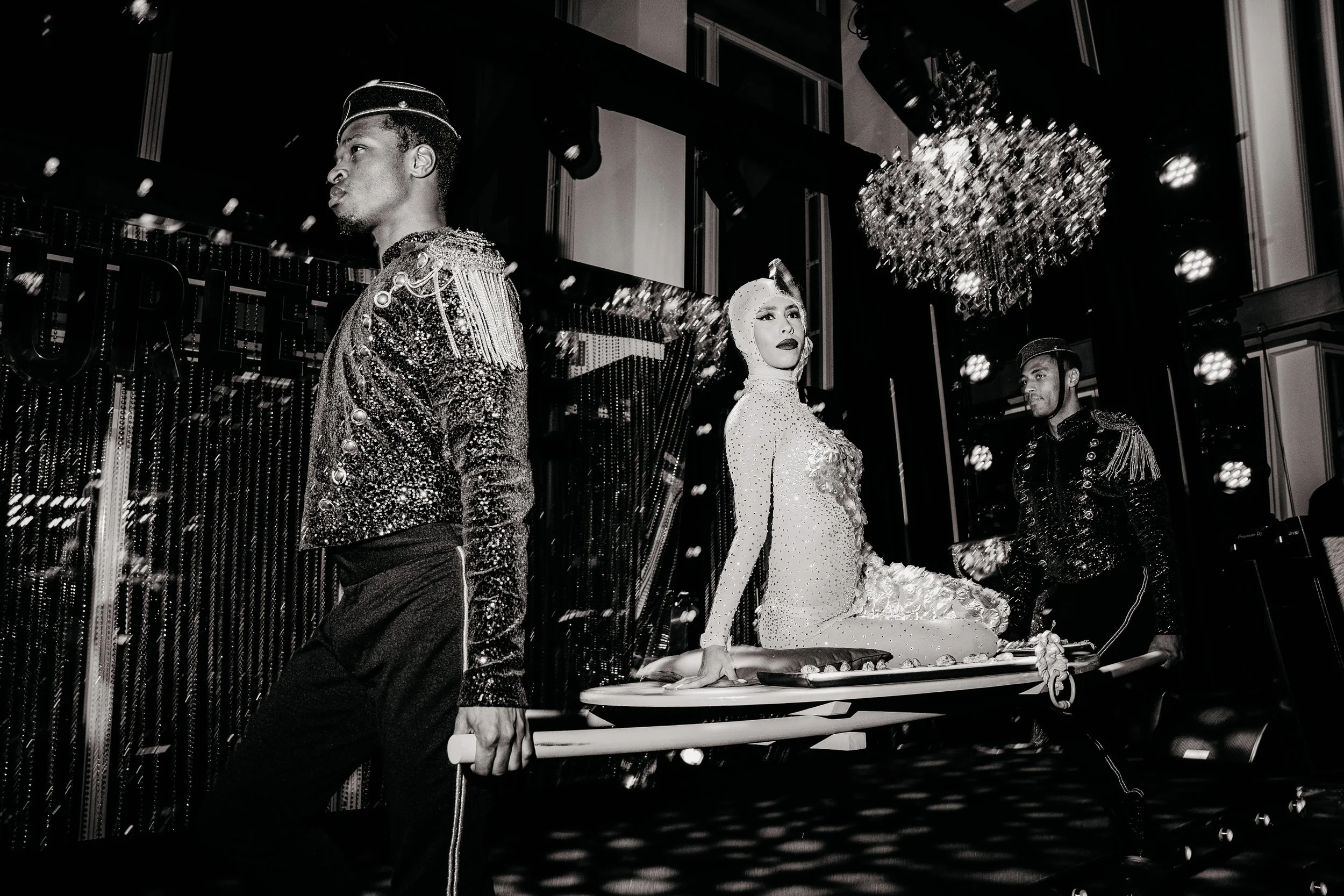 Glamorous woman embodying refined elegance during a nocturnal corporate event experience