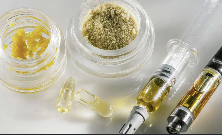 Cannabis concentrates in jars, capsules, and vape pens.