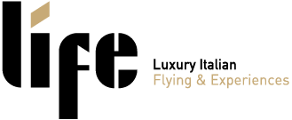 Golf course with a golfer preparing to swing, and a plane in the sky.