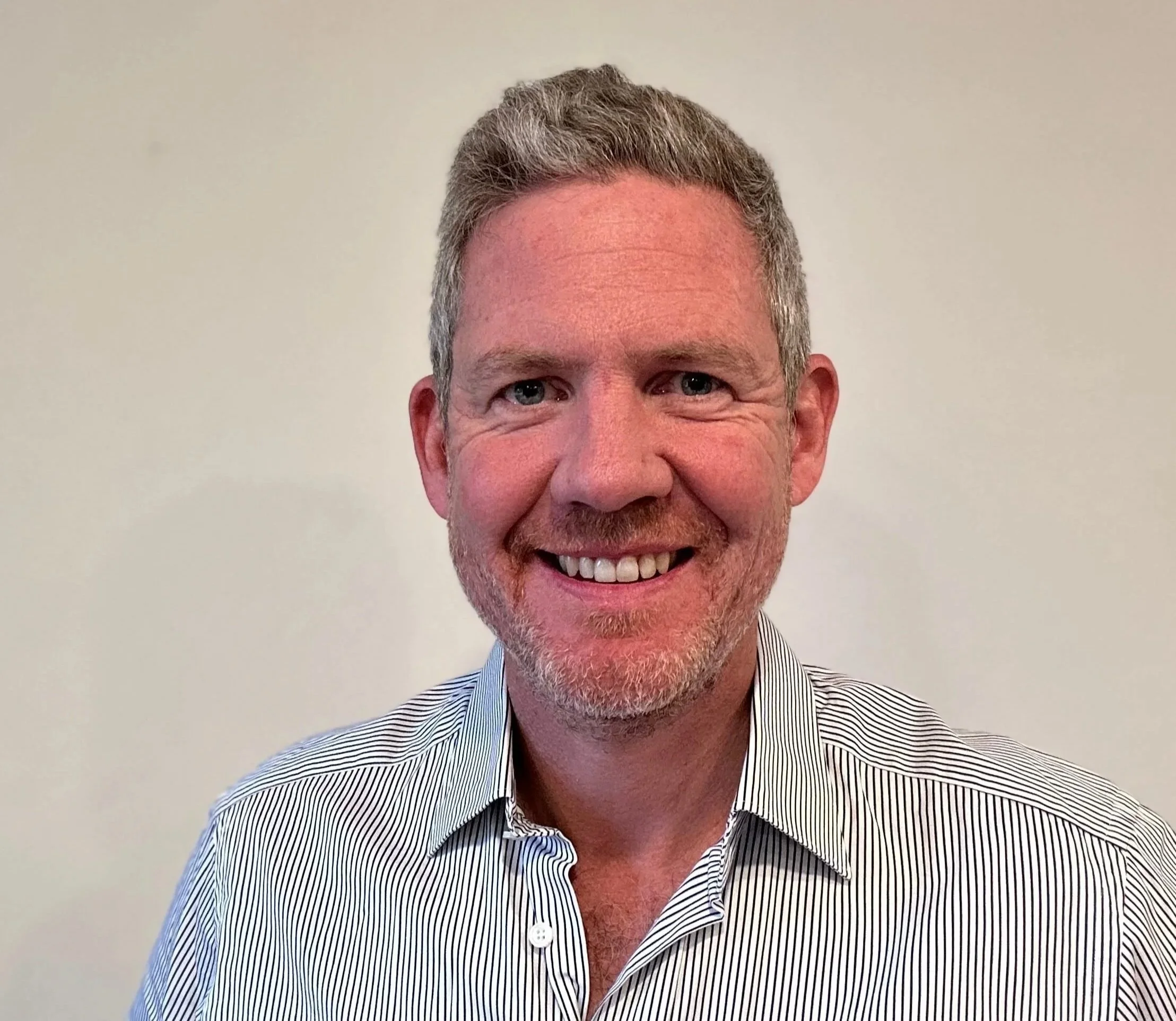 Portrait of Julian Baring - CEO and Founder of Agent Badger AI