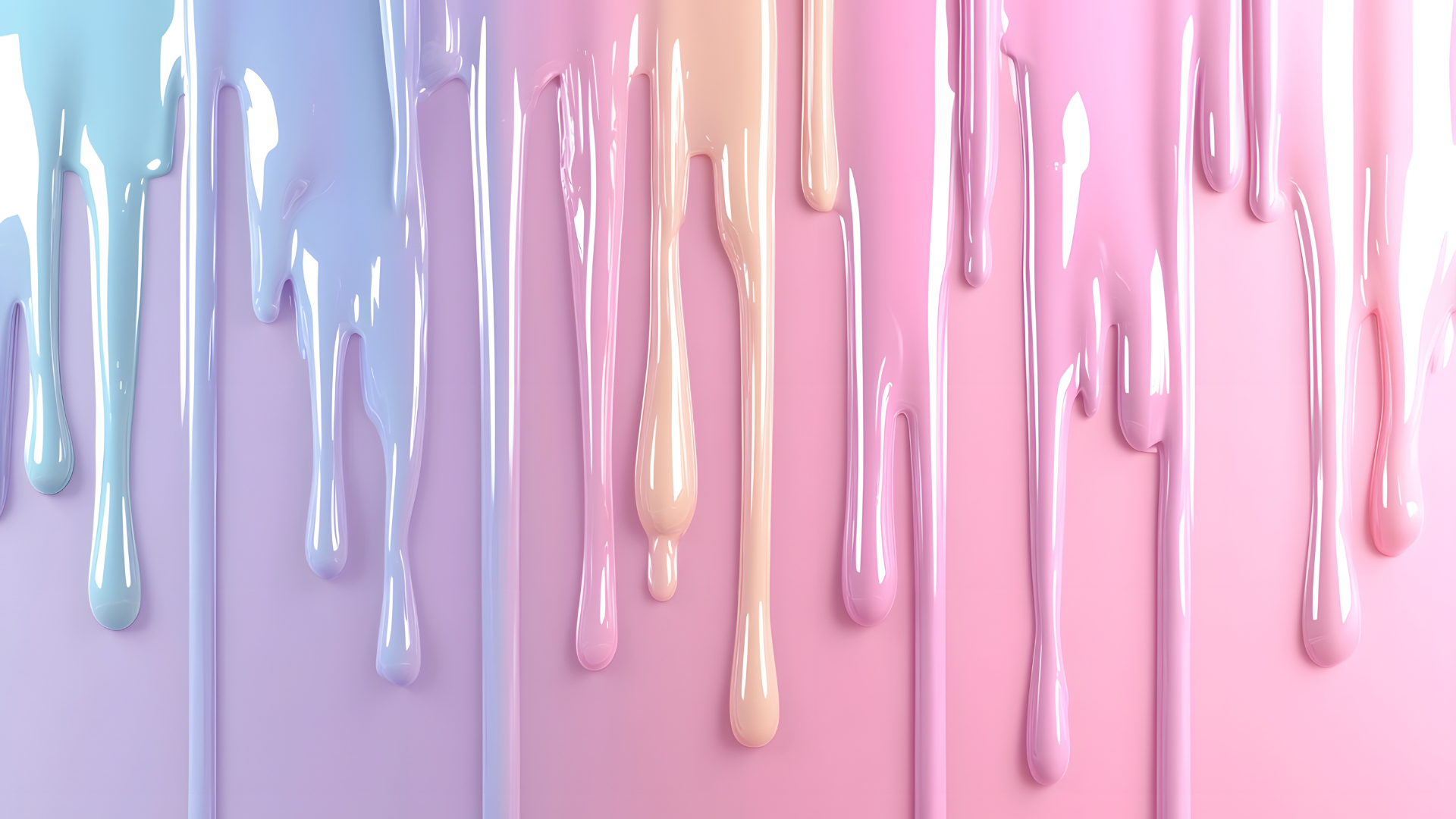 Colorful pastel paint drips on a surface, blending blue, pink, and cream hues