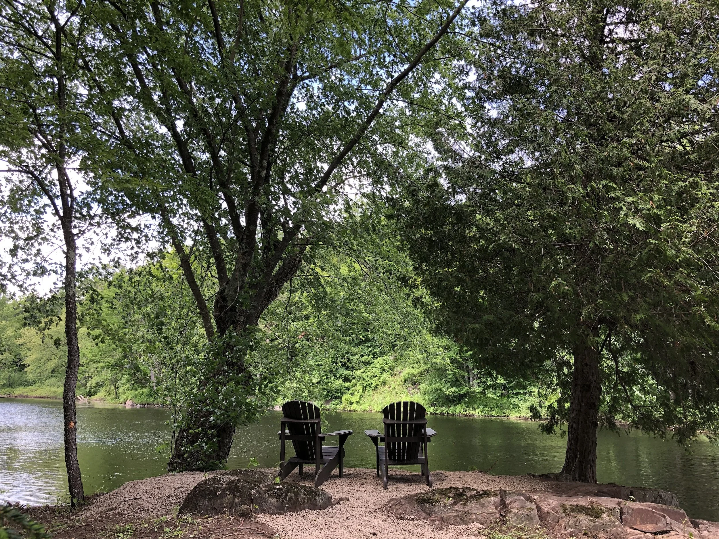 Viewing vista on the river at the romantic Black River Retreat couples resort