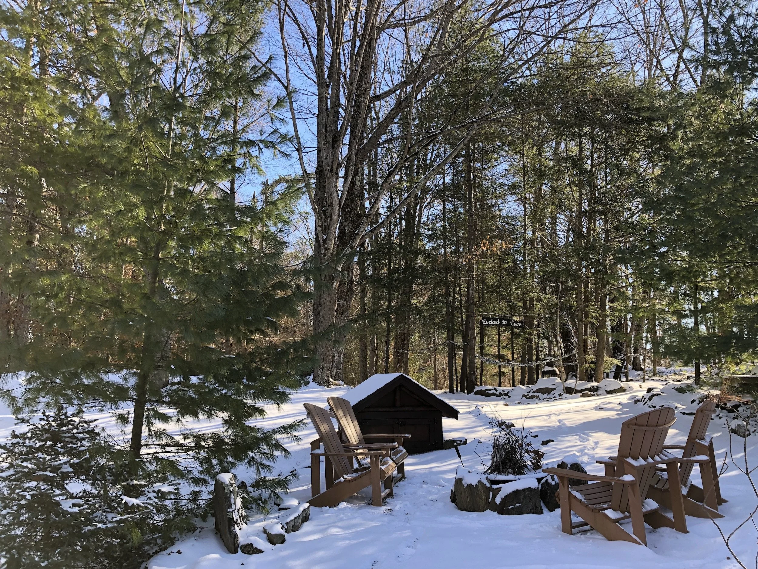 Romantic fire pit adjacent to the love lock secret garden at the Black River Retreat romantic couples resort