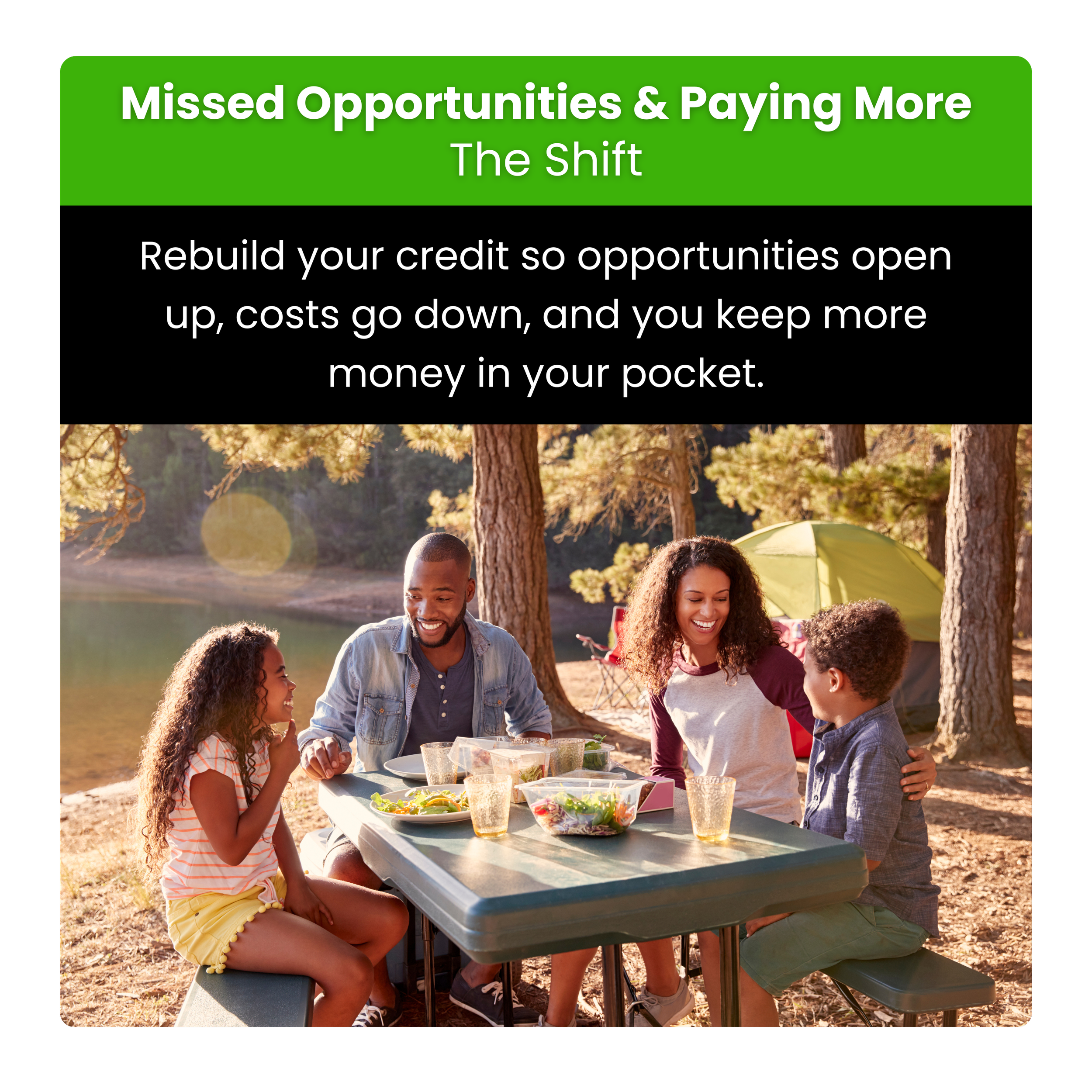Family enjoying a picnic outdoors near a lake in the woods, sitting at a table with food and drinks.