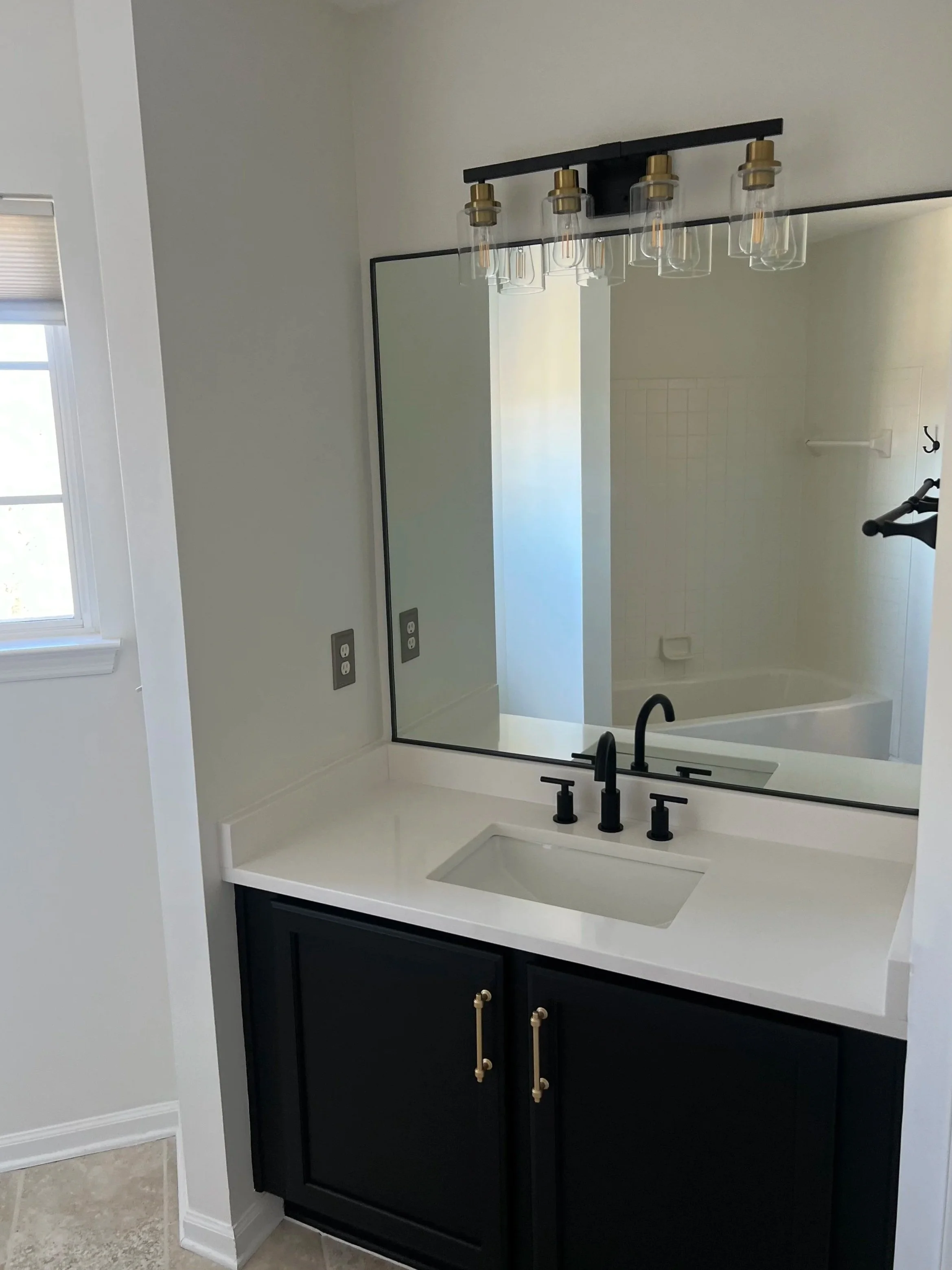 Bathroom double vanity detailed and polished during residential service.
