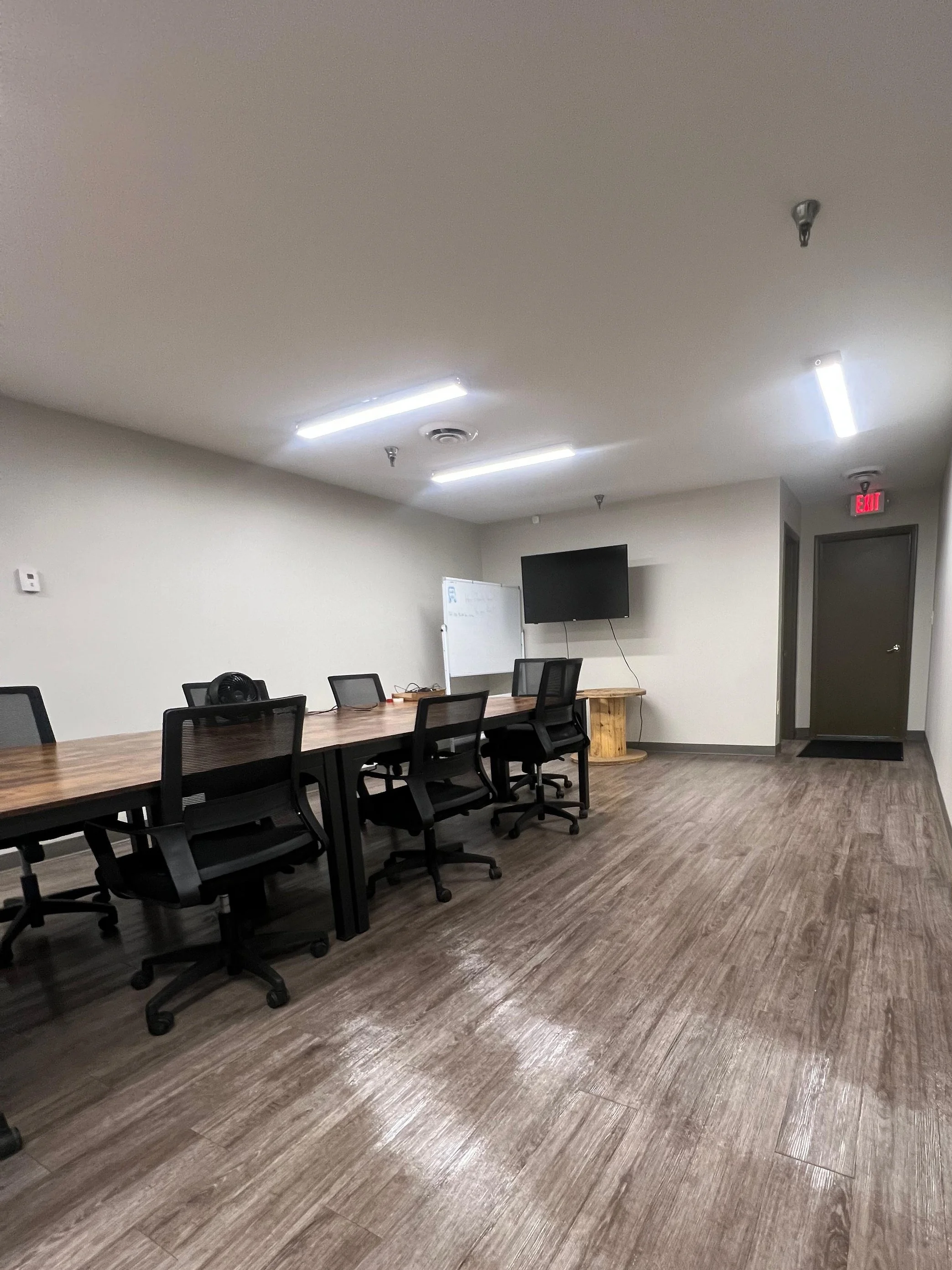 Clean and organized conference room after professional commercial cleaning service.