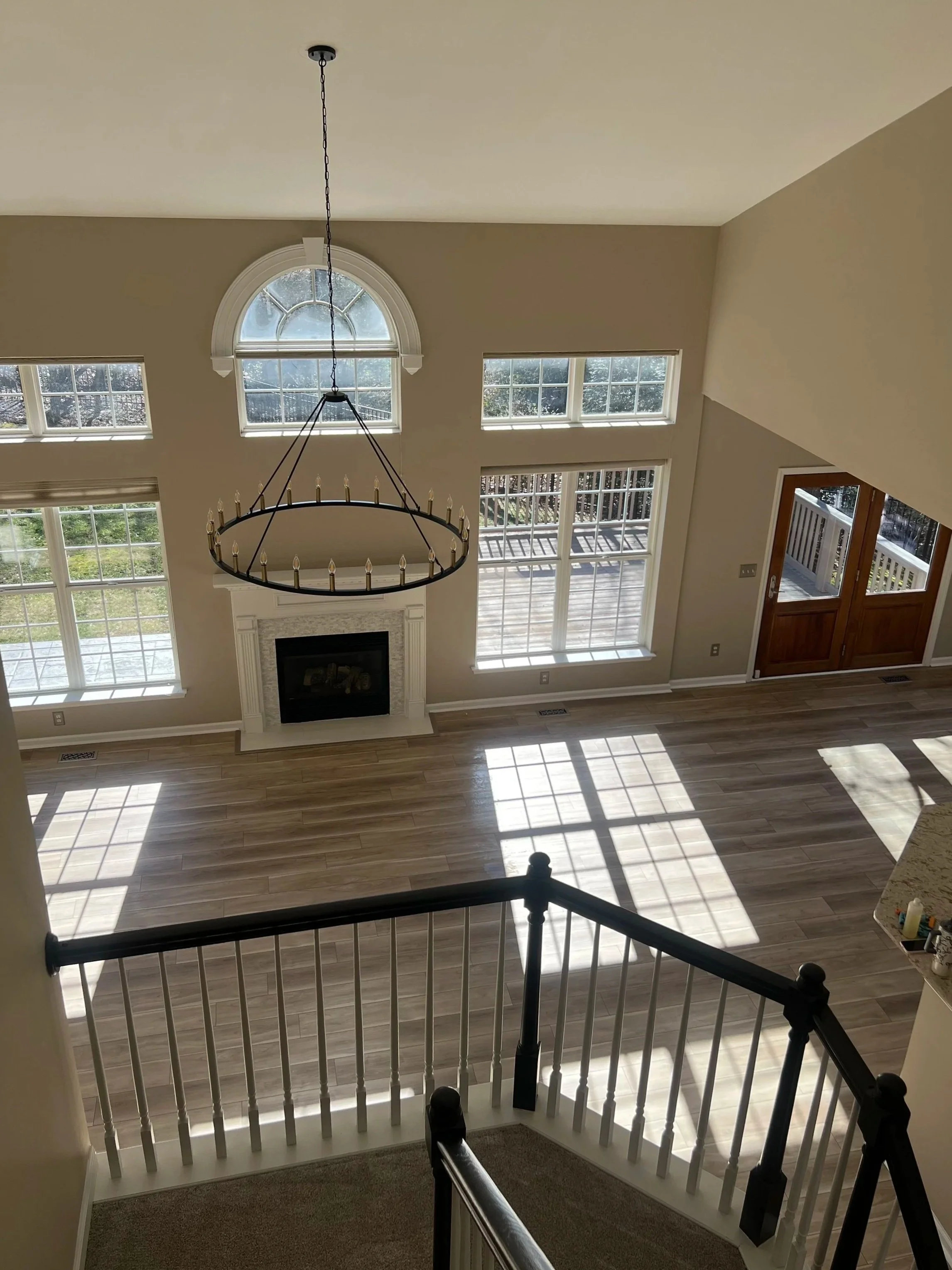 Living room with chandelier cleaned and prepared professionally.