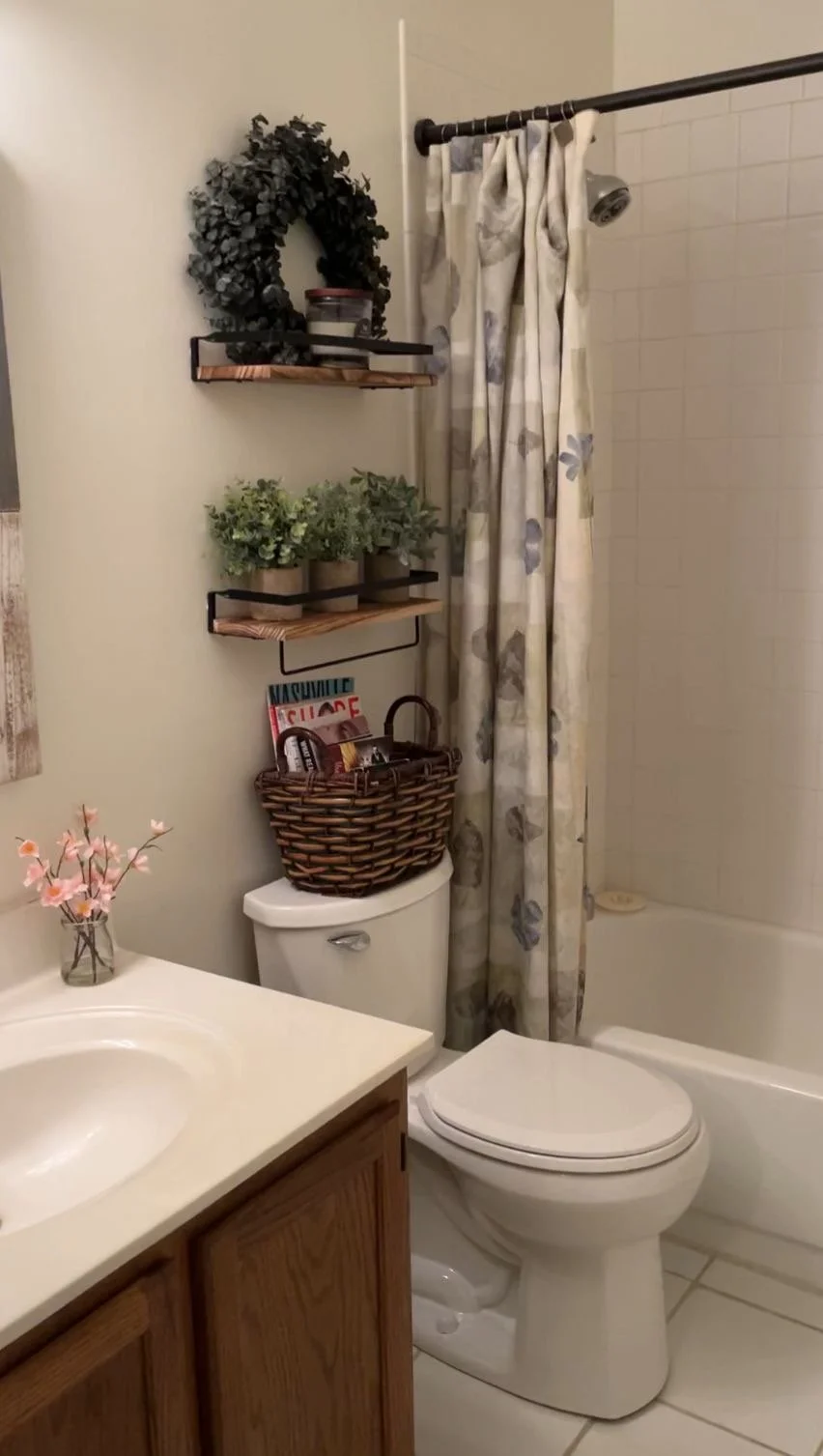 Small bathroom cleaned and organized during residential cleaning service.